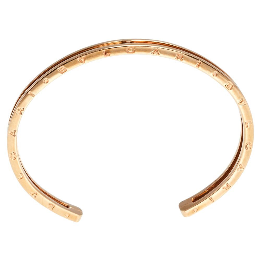 Adorn your wrist with this stunner of a bracelet from Bvlgari. The piece is from their B.Zero1 collection and has been crafted from 18k rose gold into a cuff silhouette. It is complete with the brand's lettering on the contours. The collection has