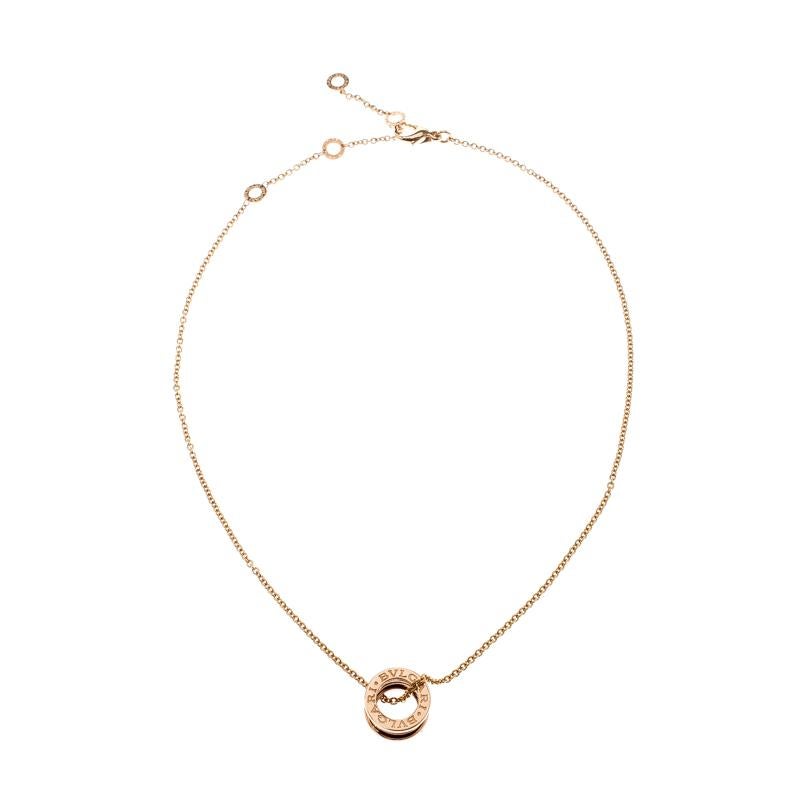 This Bvlgari piece is from their B.Zero1 collection and it has been wondrously crafted from 18k rose gold. The pendant is styled with the brand's lettering and held by a chain with a lobster clasp. The collection has been designed by blending the