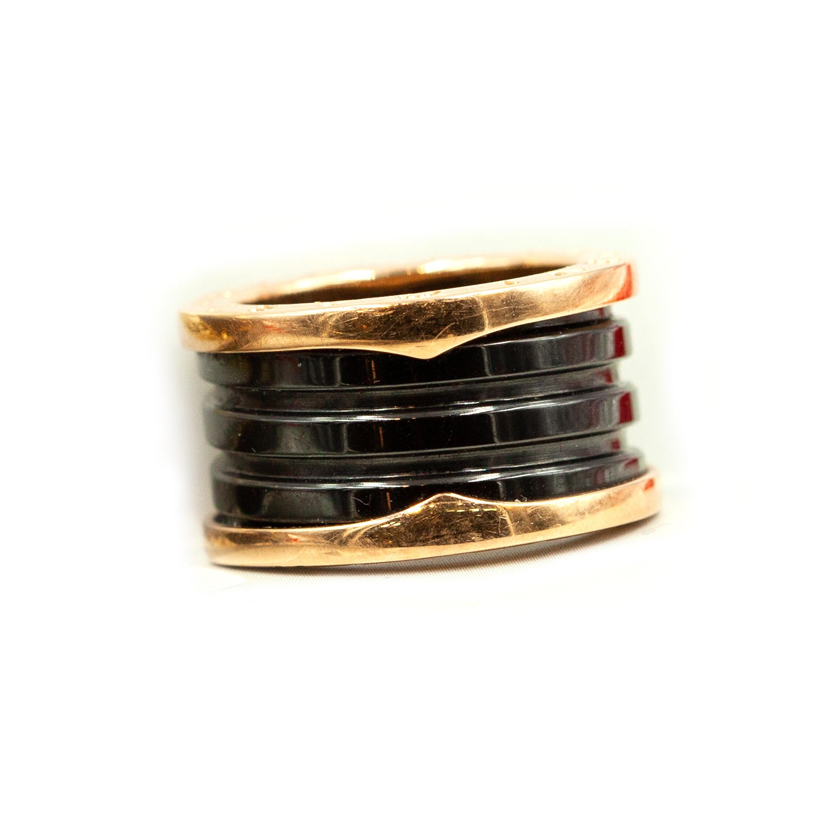 Authentic BVLGARI B.Zero 1 Ring
4-band Spiral Black Ceramic between 18K rose gold loops

Ring Size: 51  (US 5.75)
Fits US size 5.5

Approximate Measurements:
Band ~ 12mm wide / 2.4mm thick

Approximate Gross Weight:
9.70 grams

Hallmarks: BVLGARI on