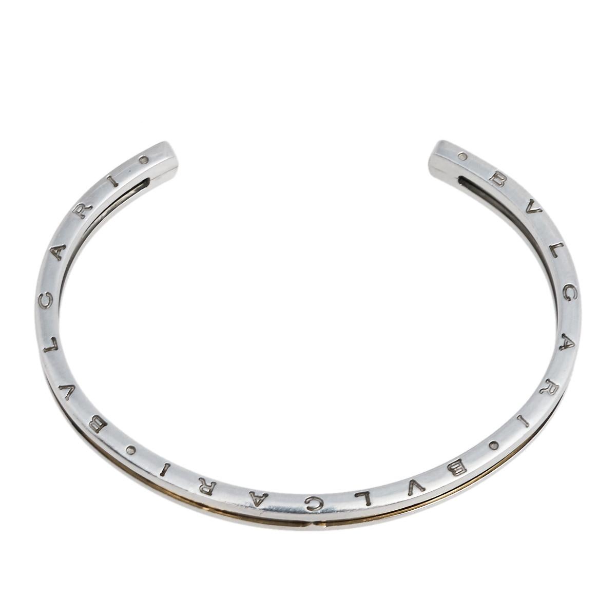 Adorn your wrist with this stunner of a bracelet from Bvlgari. The piece is from their B.Zero1 collection and has been sculpted from 18k rose gold & stainless steel. It is complete with the brand's lettering on the contours. The collection has been