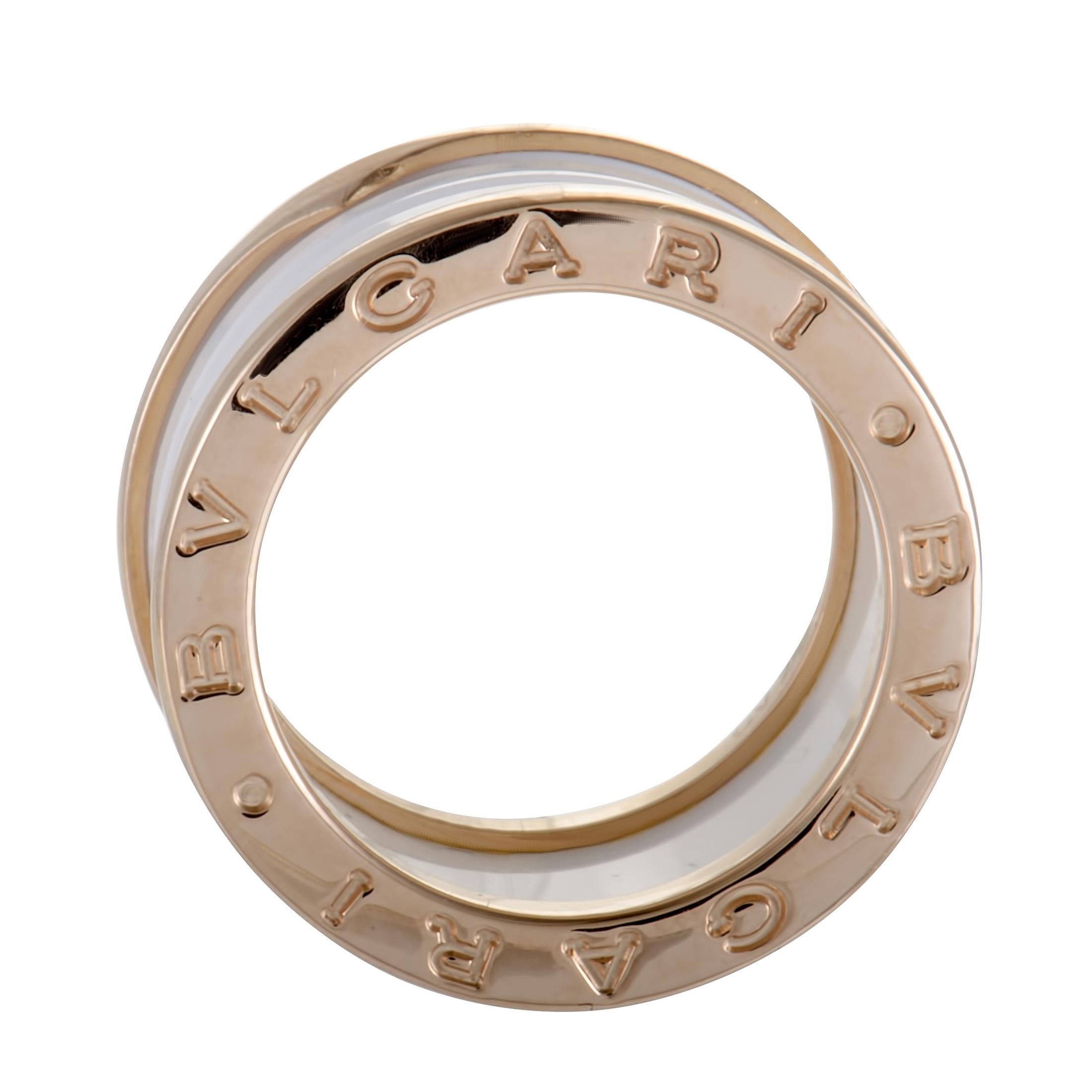 Chic and class are exhibited in this incredible 18K rose gold ring by Bvlgari. Its unique design consists of white ceramic that has 2 rose gold rings on both sides. This is truly a one-of-a-kind ring that will glam up any hand it's worn on.
Ring
