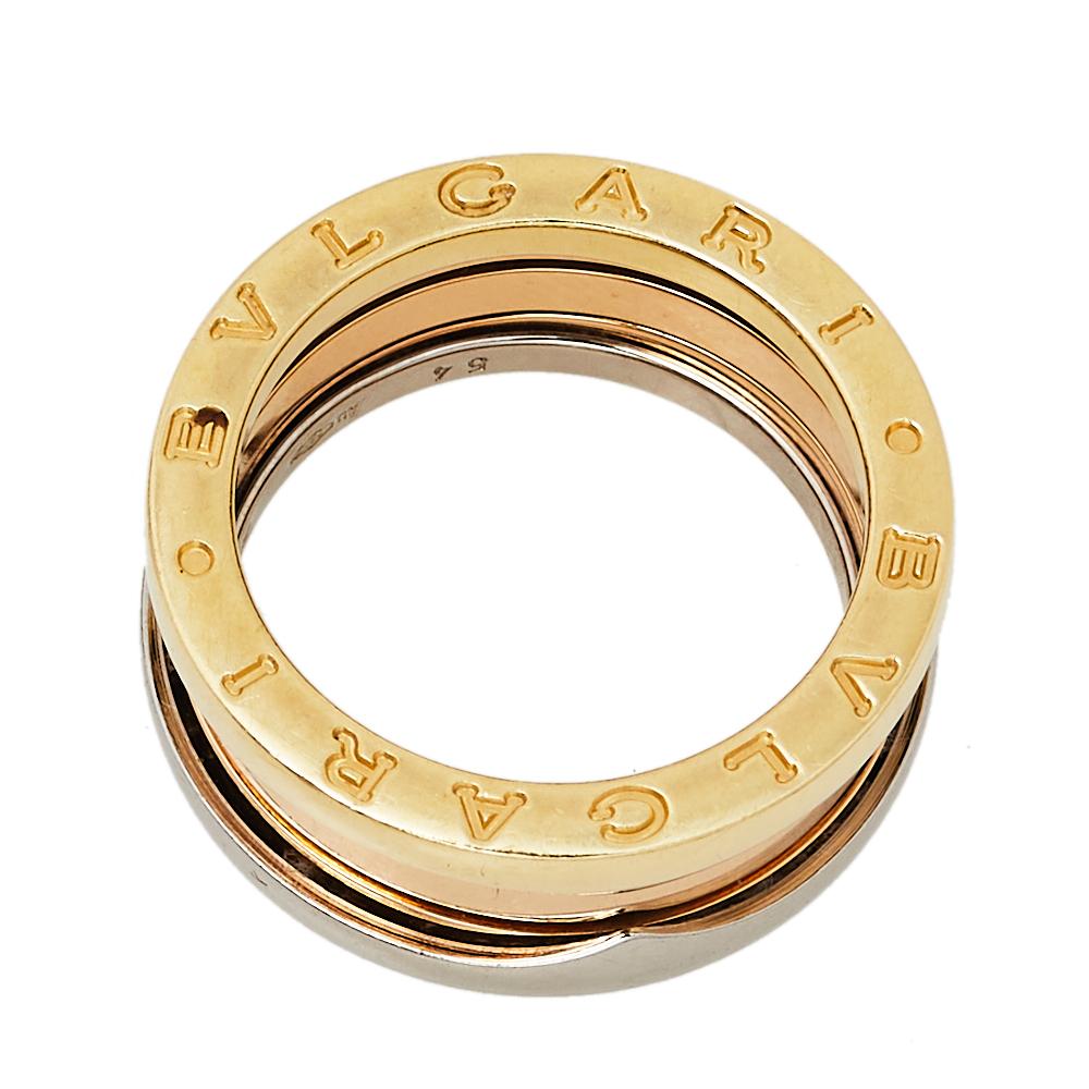 For the woman who has a refined taste in fine jewelry, Bvlgari brings her this immaculately crafted ring that has been made to be praised. Crafted from 18k three-tone gold, this Bvlgari B.Zero1 ring features three bands stacked on one another. It