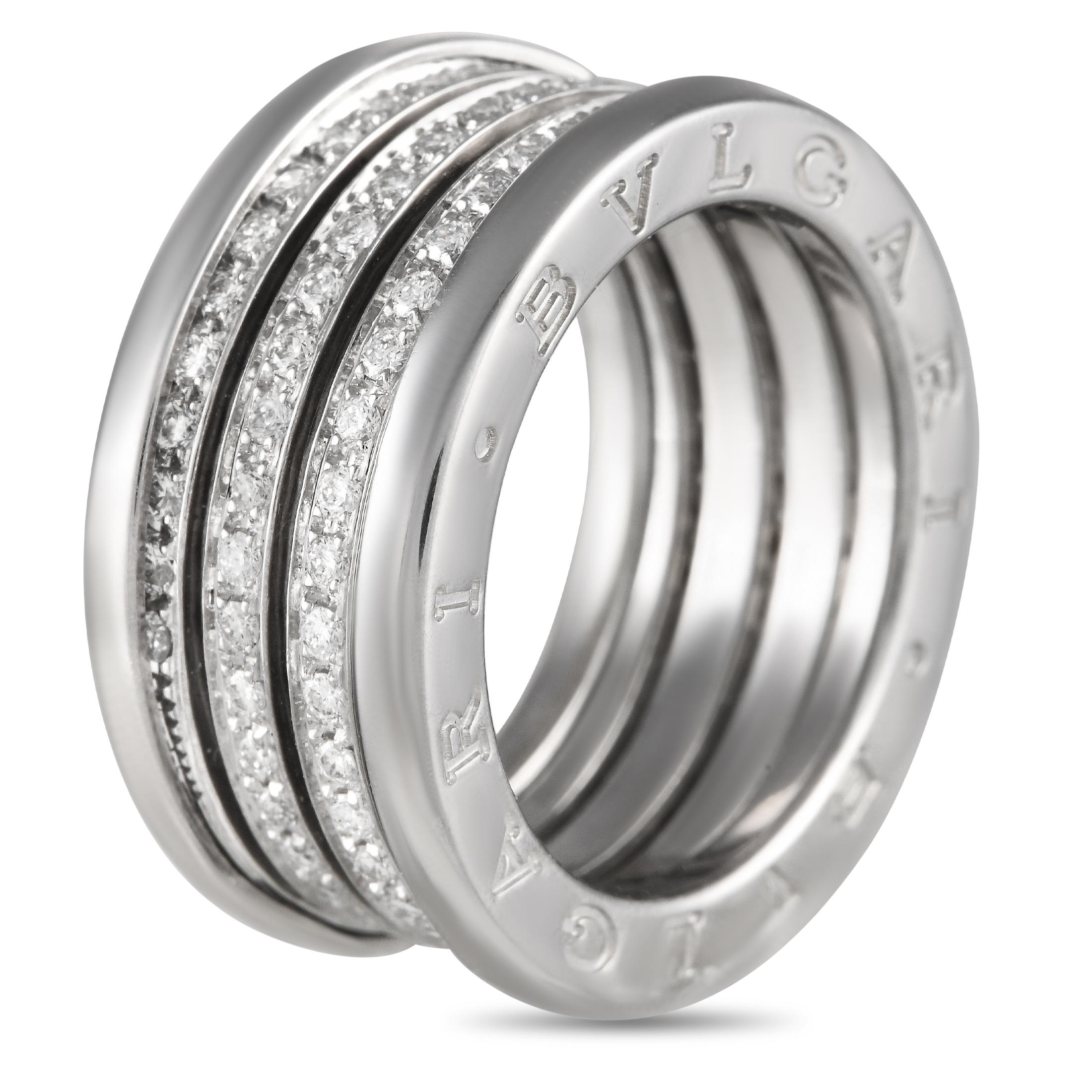 Sparkling inset diamonds with a total weight of 0.80 carats make a statement at the center of a bold 18K White Gold setting on this Bvlgari B.Zero Ring. Incredibly impactful, this piece features a 10mm wide band and a top height measuring