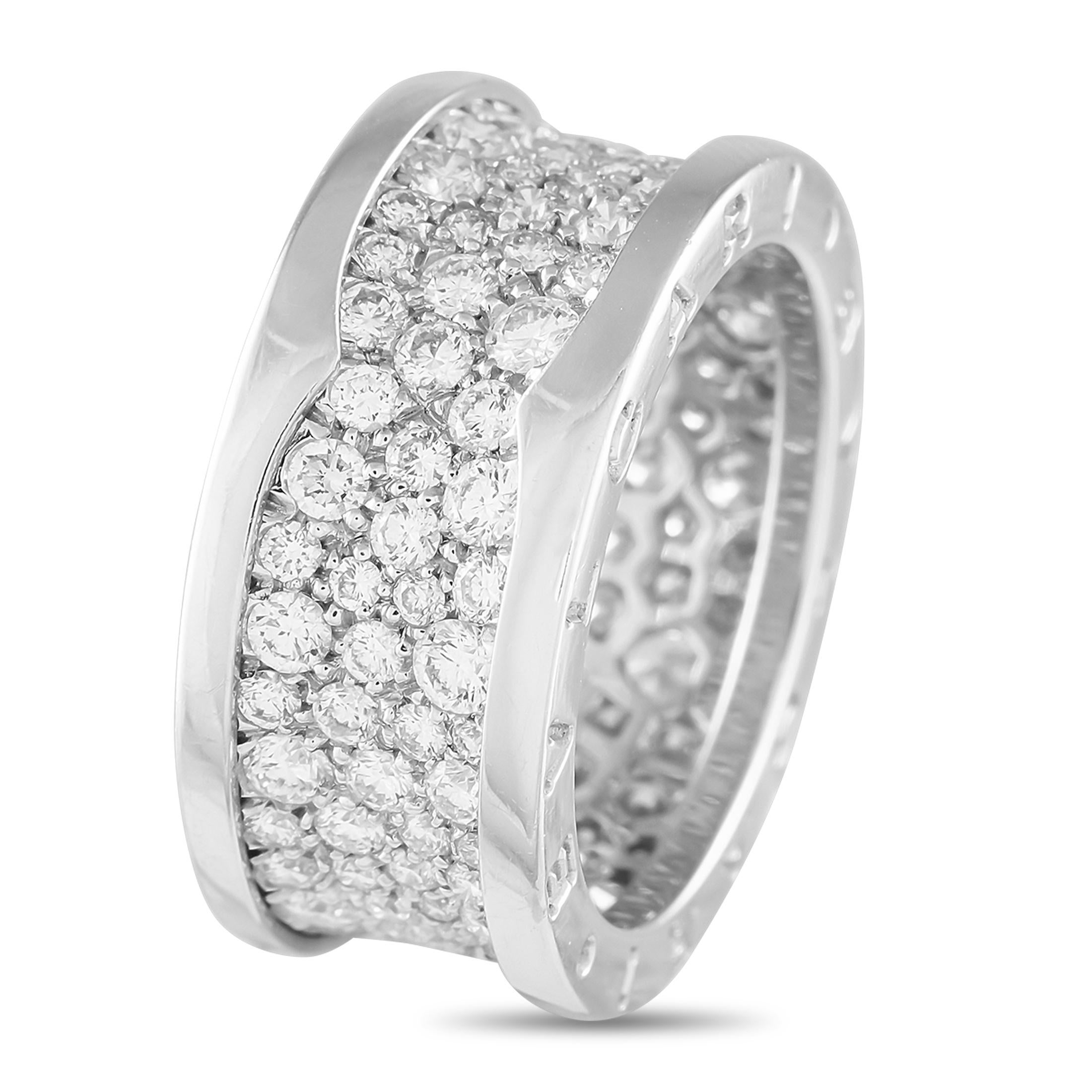 This Bvlgari B.Zero1 ring will continually catch the light. At the center of the sophisticated 18K White Gold setting, an array of Diamonds with a total weight of 2.52 carats make a sparkling statement. This luxury piece features a 15mm wide band