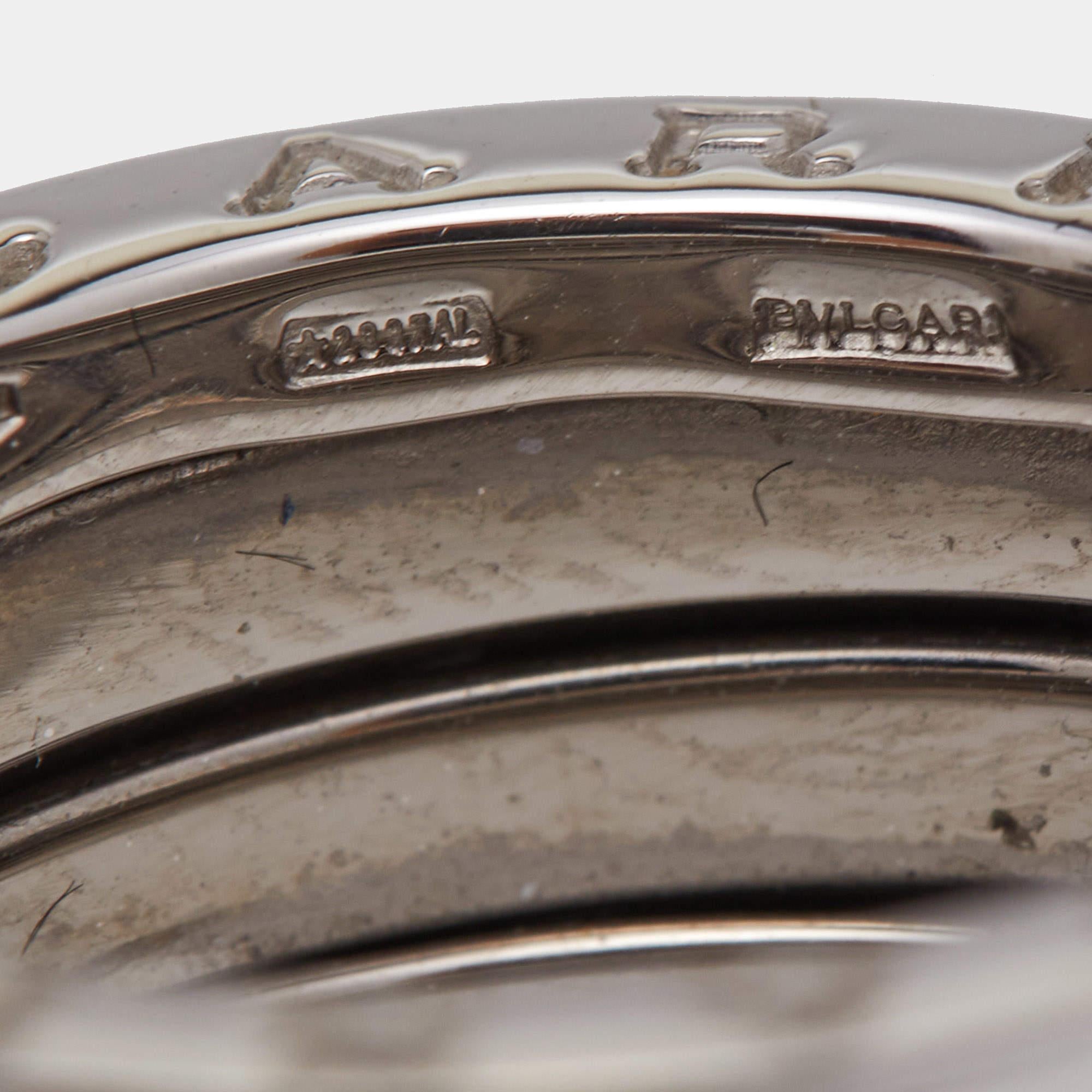 The Bvlgari B.Zero1 ring is a luxurious and iconic piece of jewelry. Crafted from exquisite 18k white gold, it features four interlocking bands, creating a contemporary and bold design. This timeless ring seamlessly combines elegance and modernity,