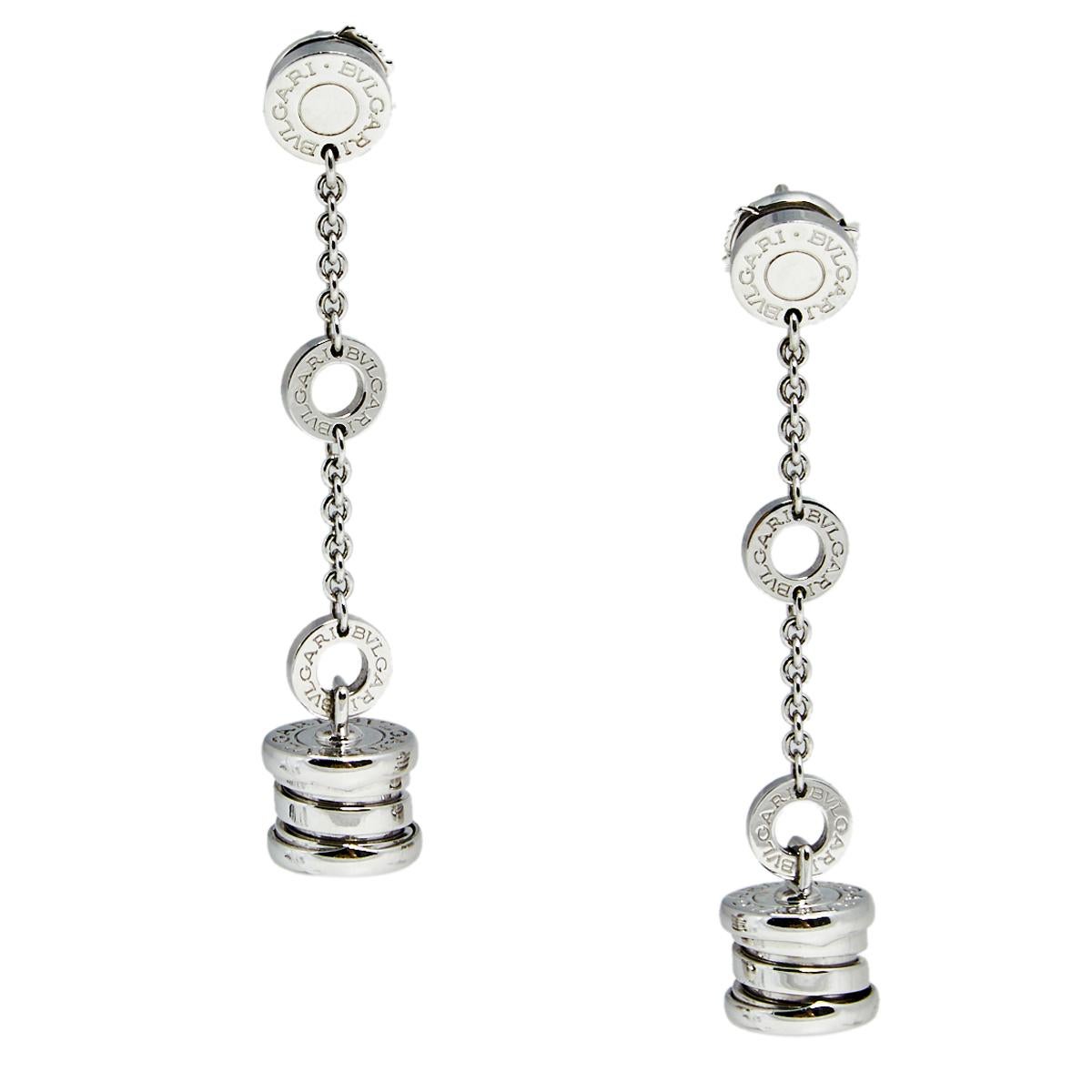 This lovely pair of earrings are by Bvlgari from the B Zero1 collection. Crafted from solid 18K white gold featuring a button top with a chain-link attaching another hope to continue to the B Zero 1 design strung through the hoops and dangling