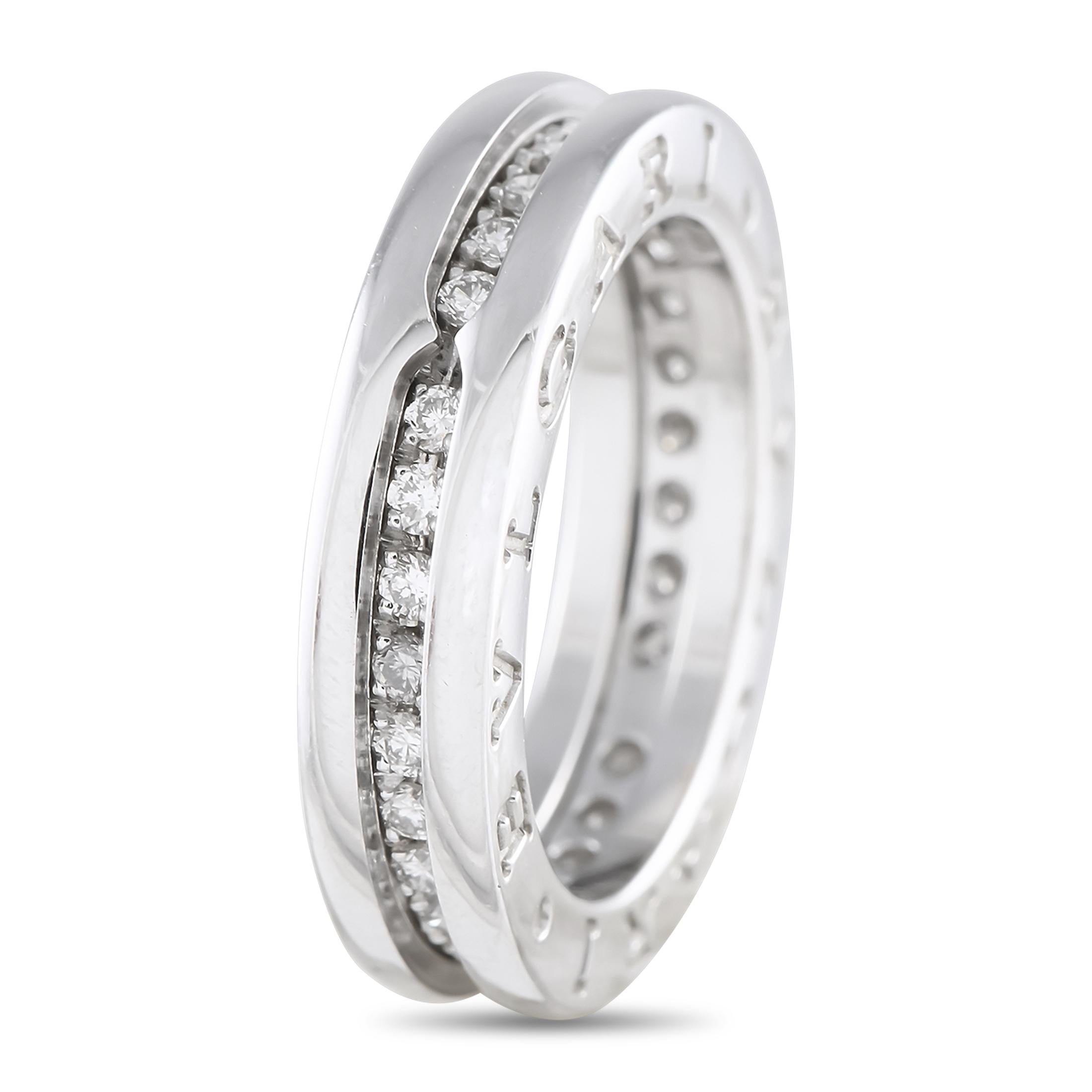 A single row of Diamonds adds plenty of sparkle to this sophisticated Bvlgari B.Zero1 ring. Chic and ideal for any occasion, the 18K White Gold setting features a 6mm wide band and a 4mm top height. The brands signature engraved at each end provides