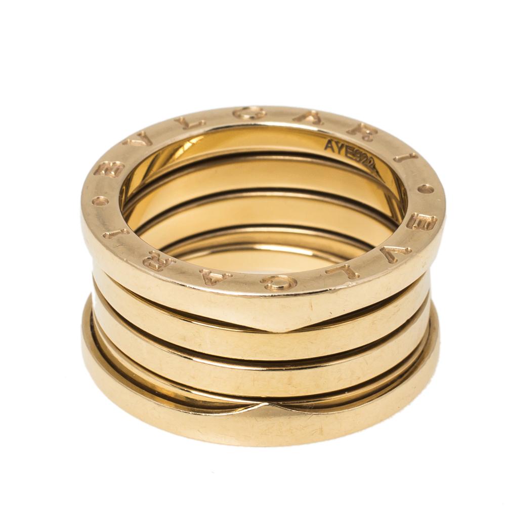 For the woman who has a refined taste in fine jewelry, Bvlgari brings her this immaculately crafted ring that has been made to be praised. Crafted from 18k yellow gold, this Bvlgari B.Zero1 ring features four bands stacked on one another. It comes