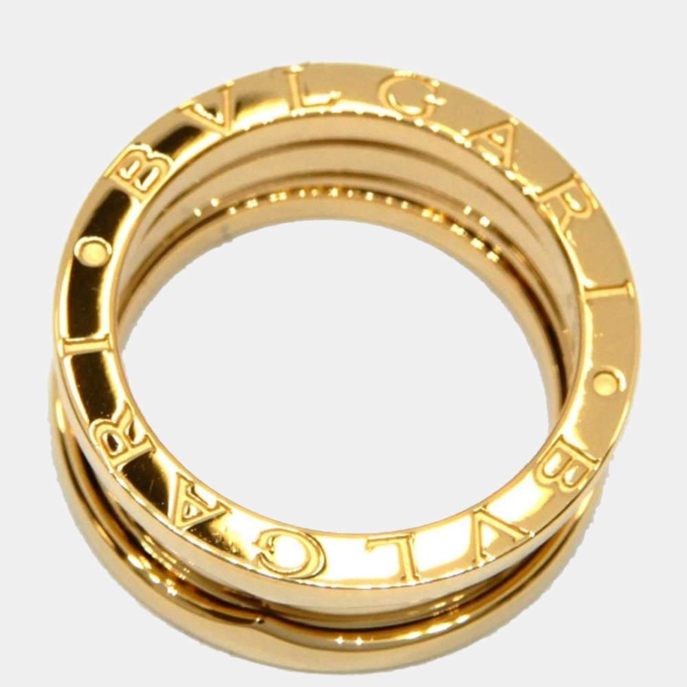 The house of Bvlgari brings you this chic ring from their B-Zero1 line. It has an elegant and graceful 18k yellow gold body with the brand name engraved on the exterior. It can add a tinge of sophisticated charm to your formal attire or casual