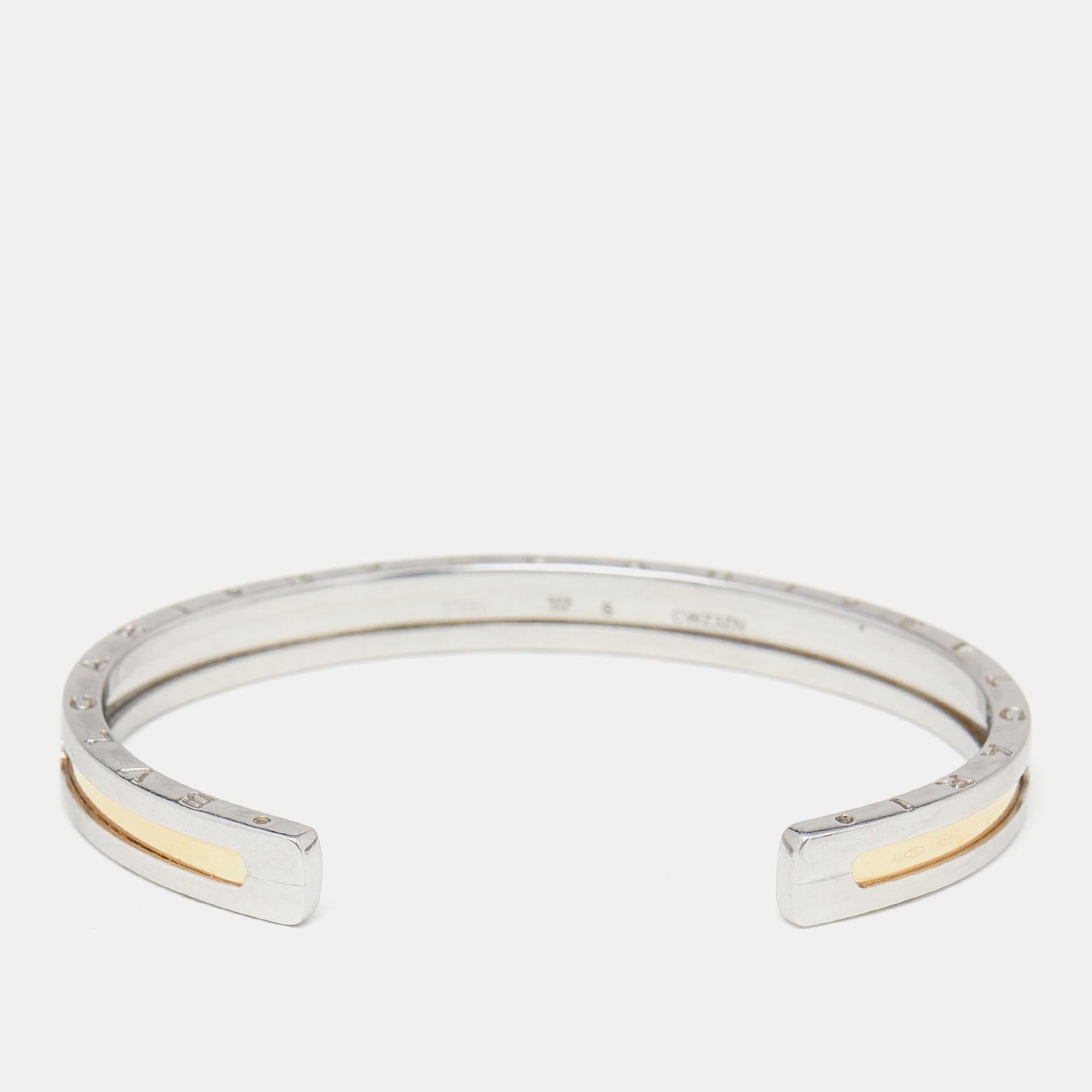 Adorn your wrist with this stunner of a bracelet from Bvlgari. The piece is from their B.Zero1 collection, and it has been crafted from stainless steel and beautifully centered with 18k yellow gold. It is complete with the brand's lettering on the