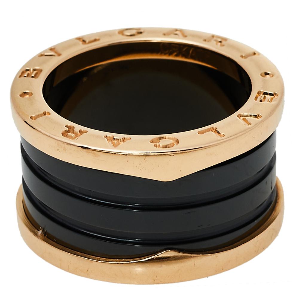 Exquisite details take center stage in this ring from Bvlgari. This B.Zero1 ring comes crafted from 18K rose gold, sculpted as a band, and flaunts black ceramic bands stacked together. It has BVLGARI BVLGARI engravings on both sides. Wear it as a