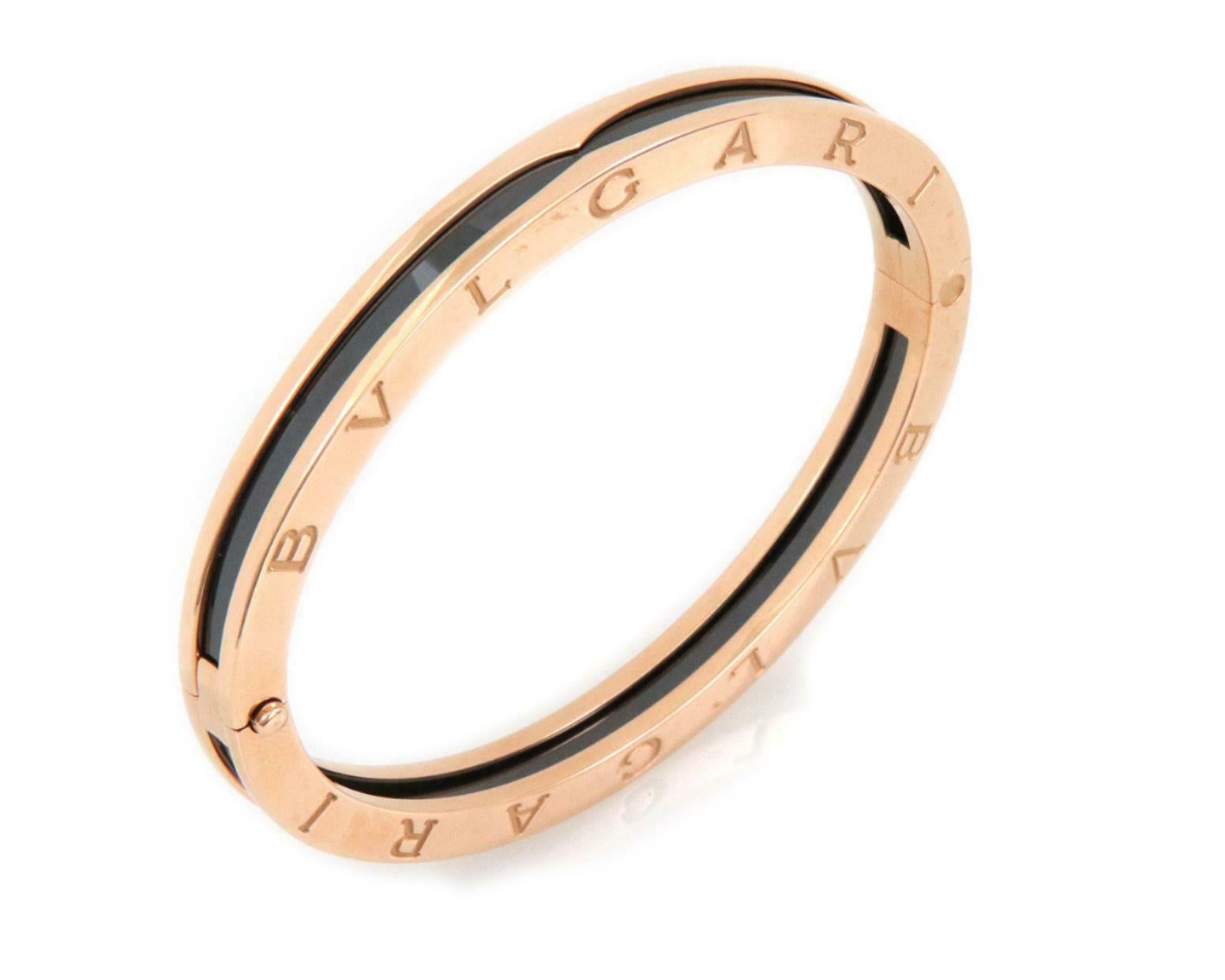 Sophisticated and authentic by Bvlgari from the B.zero1 Collection. This gorgeous hinged bracelet is crafted from 18k rose gold with black ceramic featuring an oval shape bangle, the hinge is on one side with slide clasp on the other side, but flat