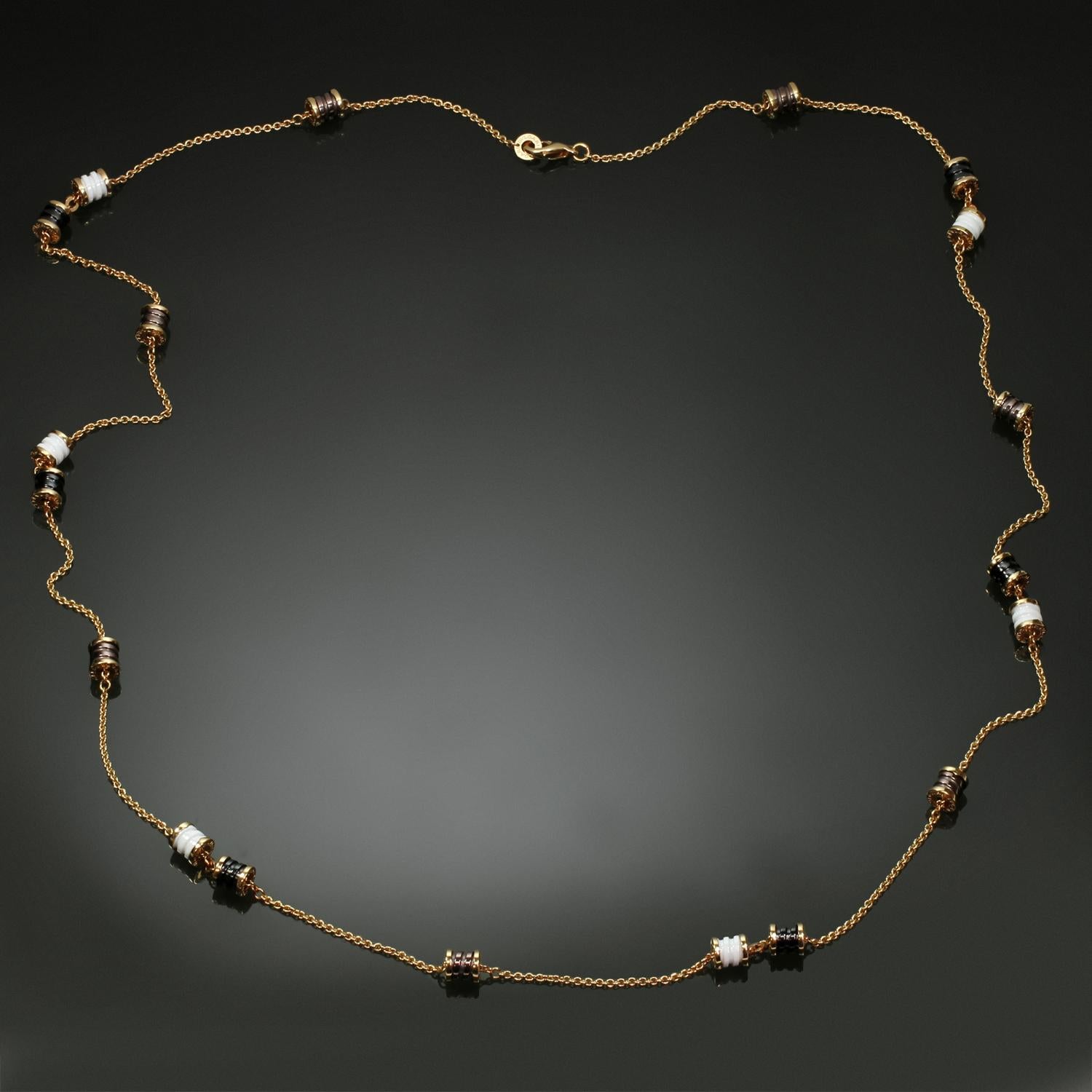 This gorgeous Bvlgari necklace from the iconic B.Zero1 collection is crafted in 18k rose gold and accented with 19 rondels in white, black, and bronze ceramics. Made in Italy circa 2020s. Measurements: 0.27