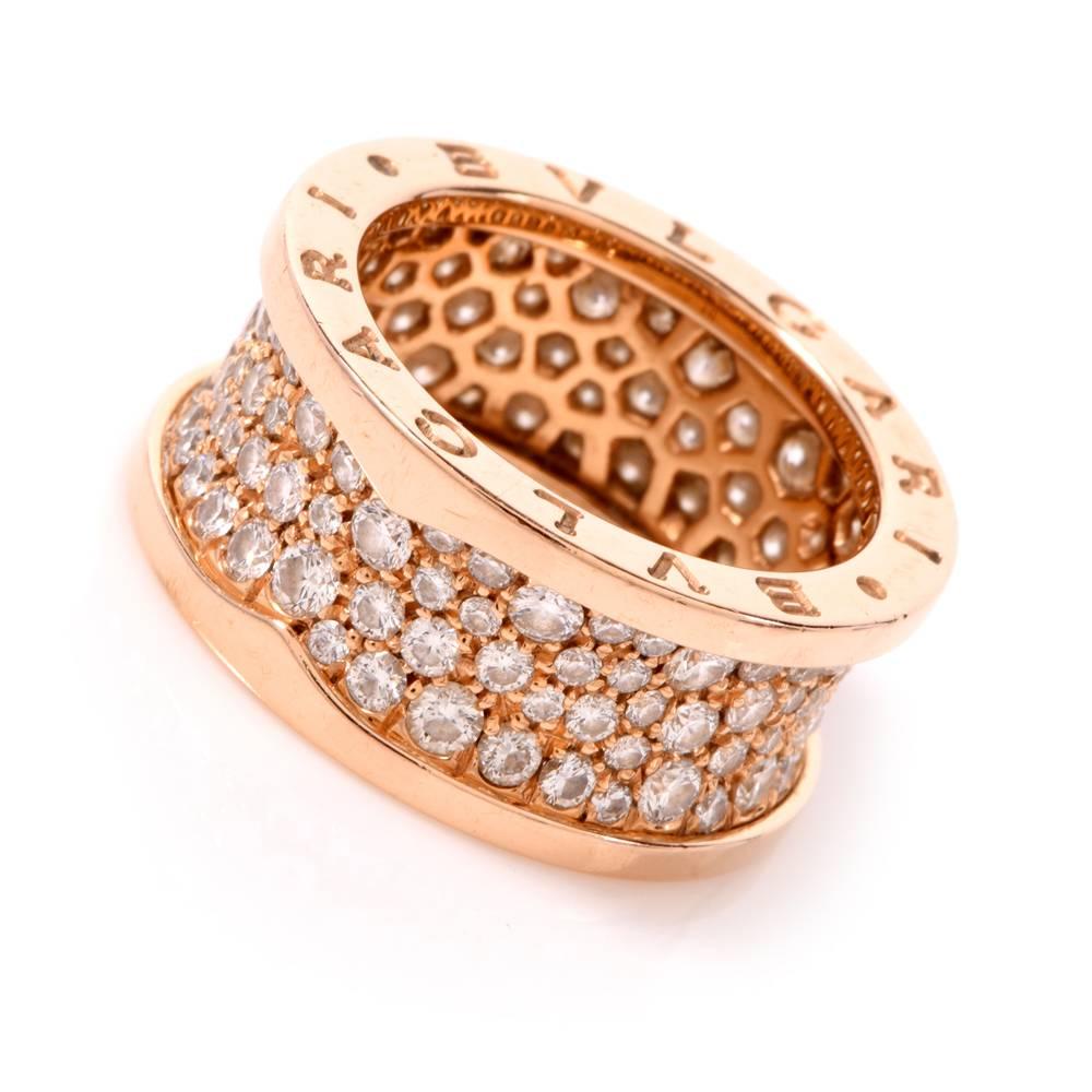 B. zero 1 ring in 18 Kt rose gold set with pave diamonds on the adges

This authentic Bvlgari 4-band eternity rig from the highly prized Bvlgari B.Zero 1 Collection is crafted in solid 18 karat rose gold, weighing 12.9 grams and measuring 12 mm
