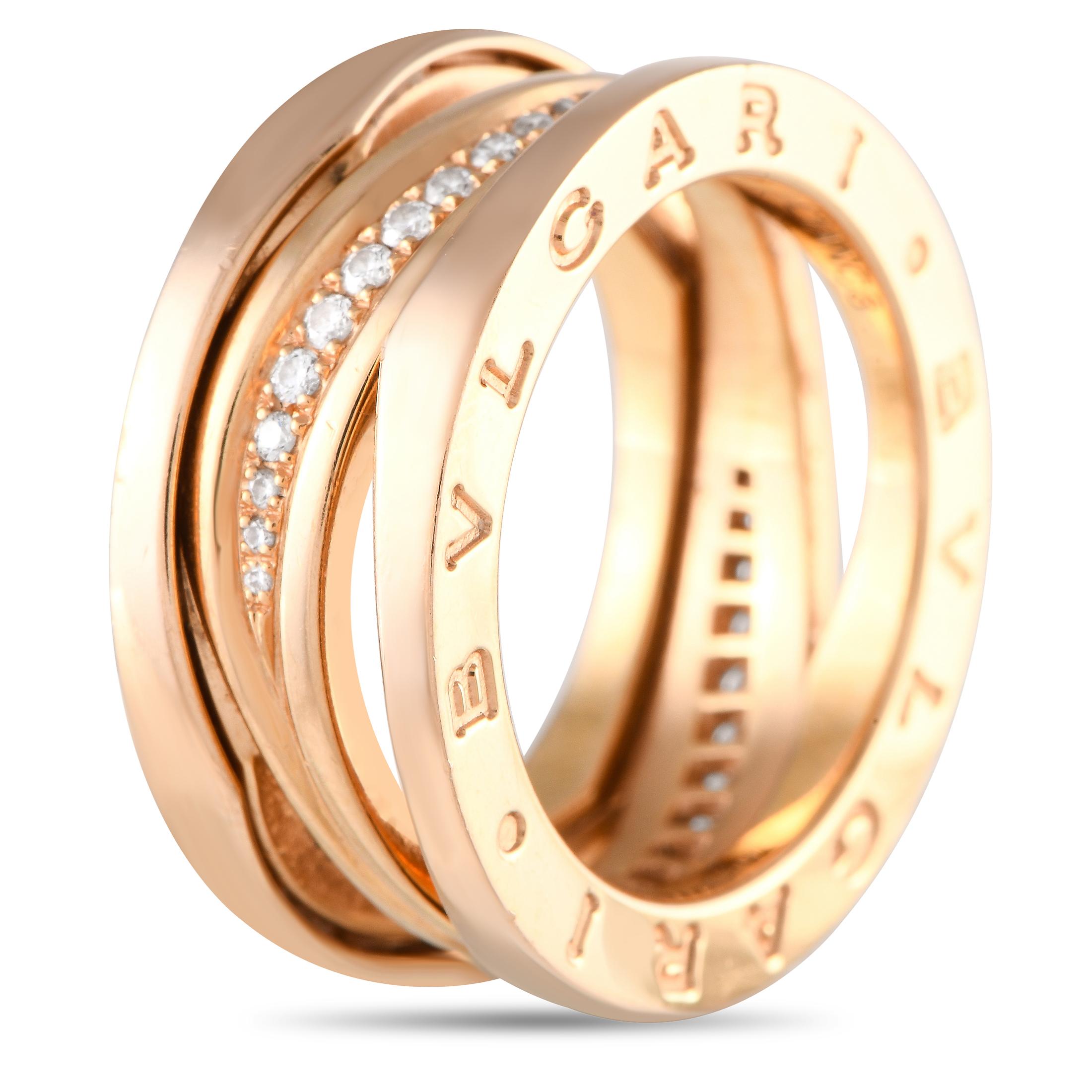 With a design inspired by Rome's iconic Colosseum, the B.Zero1 Legend ring by Bvlgari is truly fascinating. Rendered in 18K rose gold, this band features the Bvlgari double logo engraved on its two sides. A ribbon of tapering round diamonds crosses