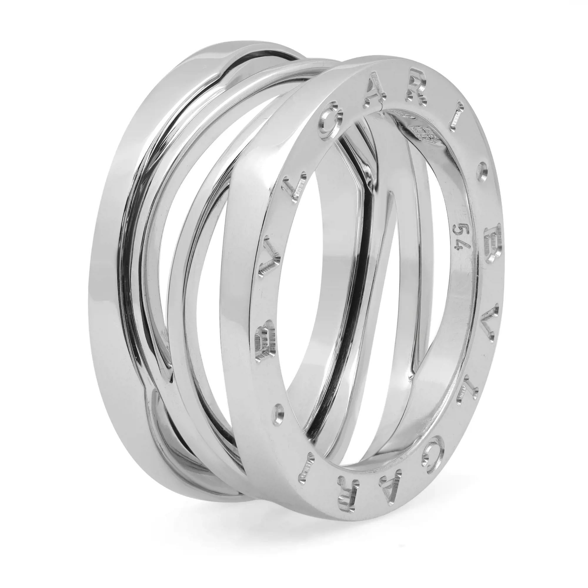 B.zero1 Design Legend jewelry is a perfect collision of modernity and tradition. Crafted in fine 18K White Gold. It features a clean modern three band ring engraved with the BVLGARI logo on both sides. This ring makes a great timeless and modern
