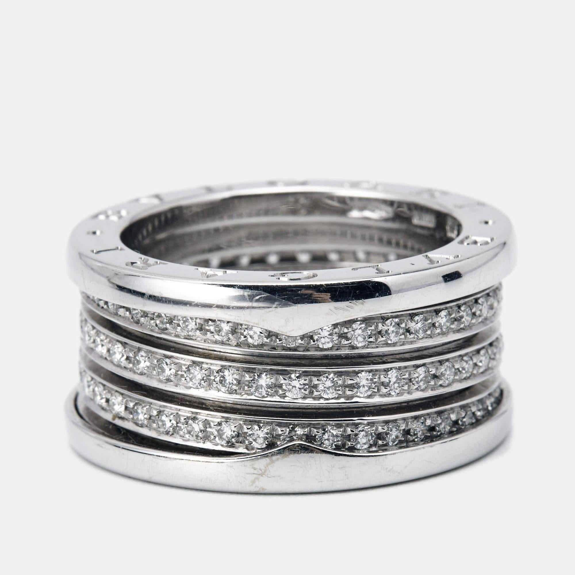 The Bvlgari B.Zero1 ring is a luxurious and captivating piece of jewelry. Crafted in 18k white gold, it features the iconic B.Zero1 spiral design, representing eternity and modernity. Adorned with brilliant-cut diamonds, this ring adds a sparkling