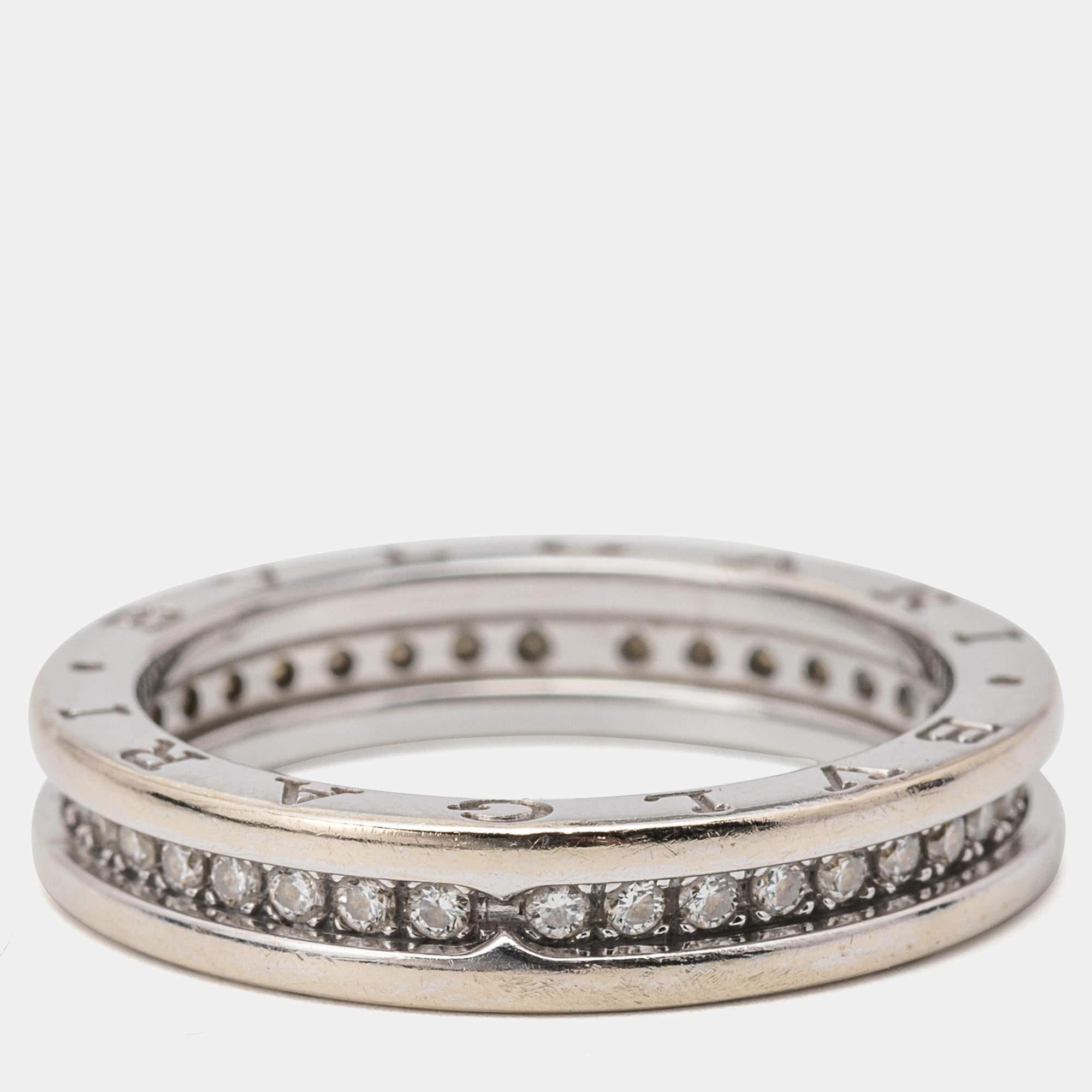 Unique and modern, this charming B.Zero1 band is from one of Bvlgari's iconic collections. Beautifully crafted from 18k white gold, the ring is added with diamonds. Inspired by the Colosseum, this ring merges exceptional creative vision and