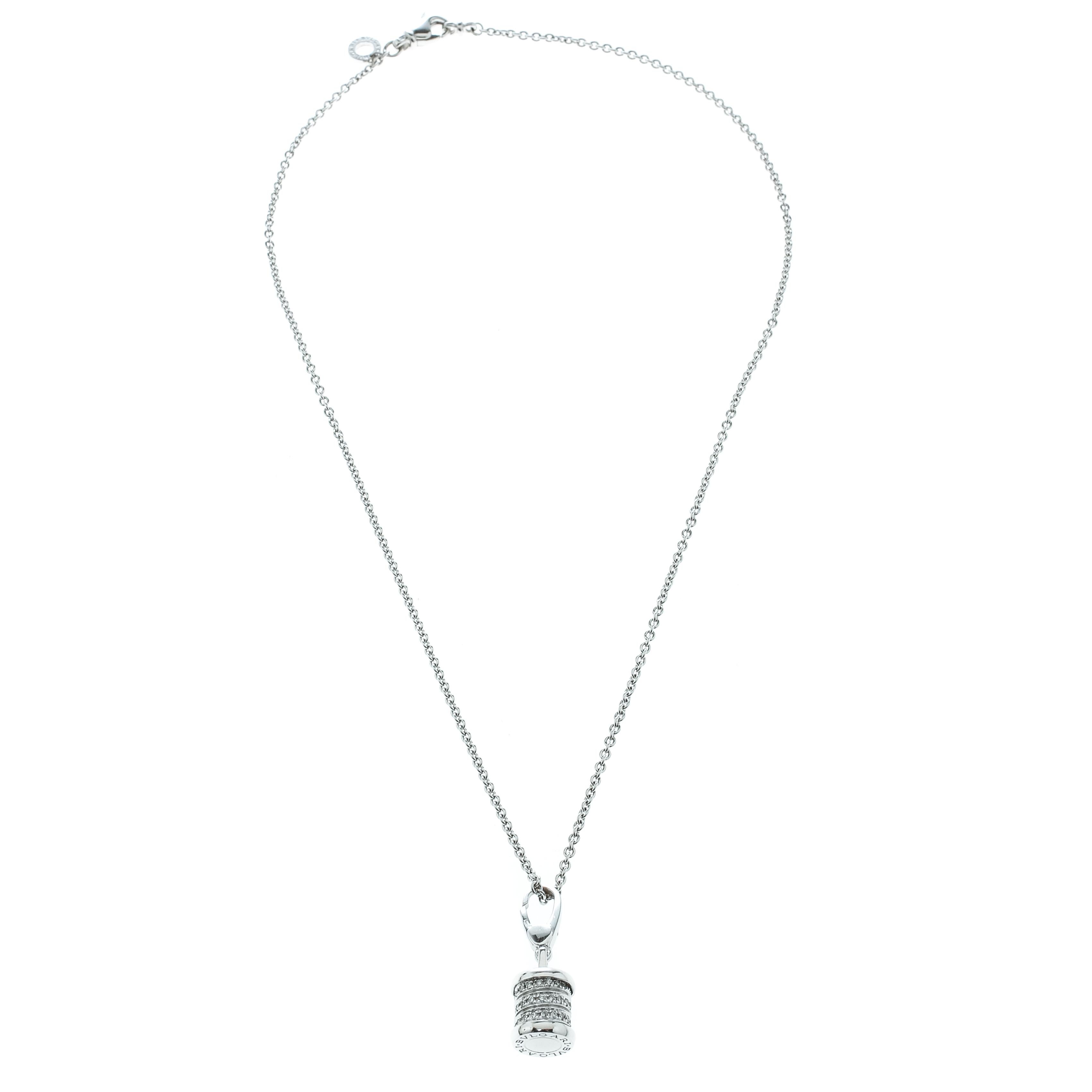 Made out of 18k white gold, this flawlessly crafted necklace by Bvlgari can be your next prized possession. Featuring high artistry, the design involves a hook pendant held by a chain with a lobster clasp. The pendant has the signature touch of