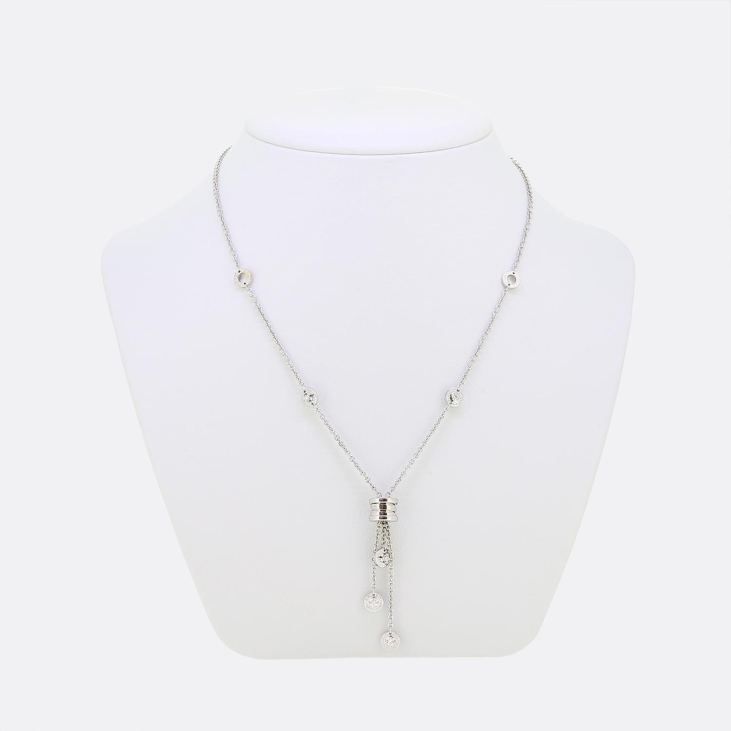Here we have a luxurious 18ct white gold diamond necklace from Bvlgari. This piece is comprised of the iconic B.zero1 motif with three tassels hanging freely. Each tassel has a circular motif at the end with a round brilliant cut diamond set to the