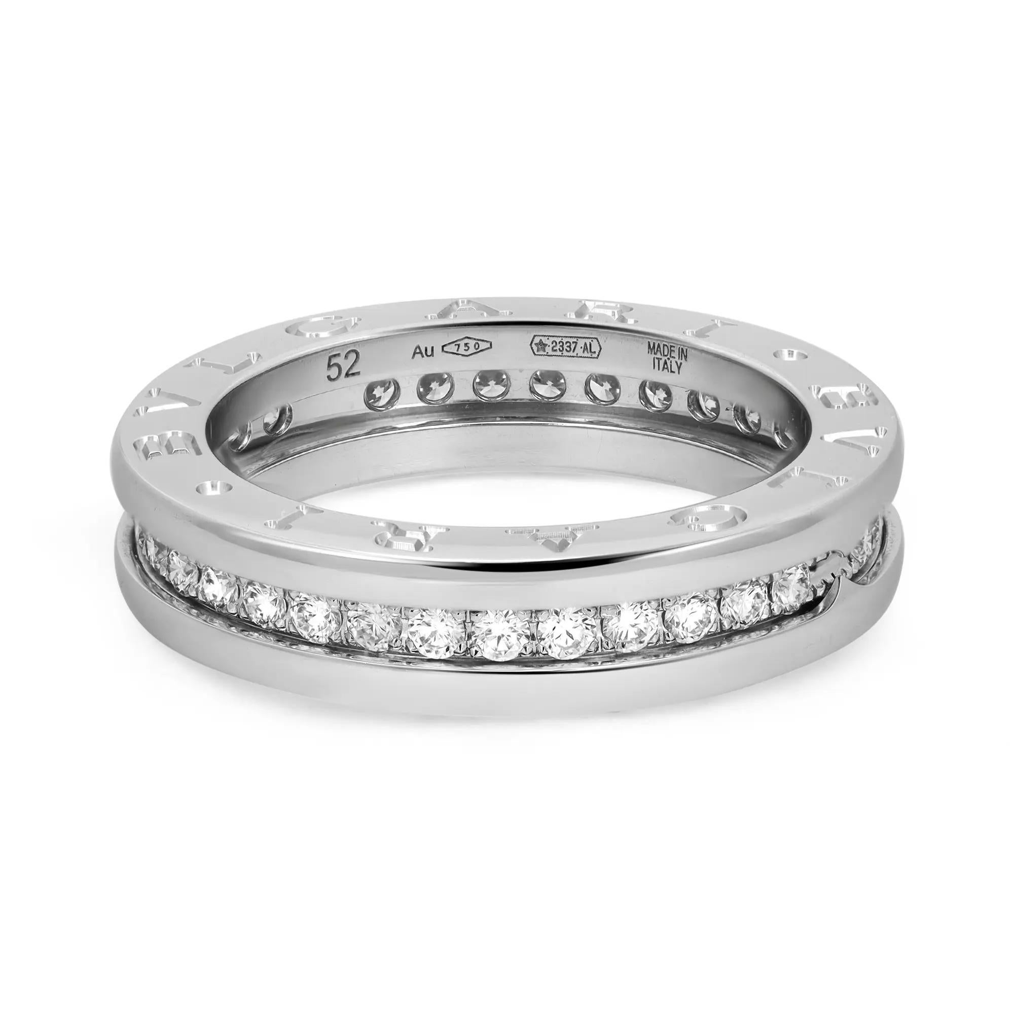 A true statement of Bvlgari’s creative vision, this ring is a perfect fit for your jewelry collection. Crafted in lustrous 18K white gold. It features a one band ring studded with channel set round brilliant cut diamonds with a Bvlgari logo engraved