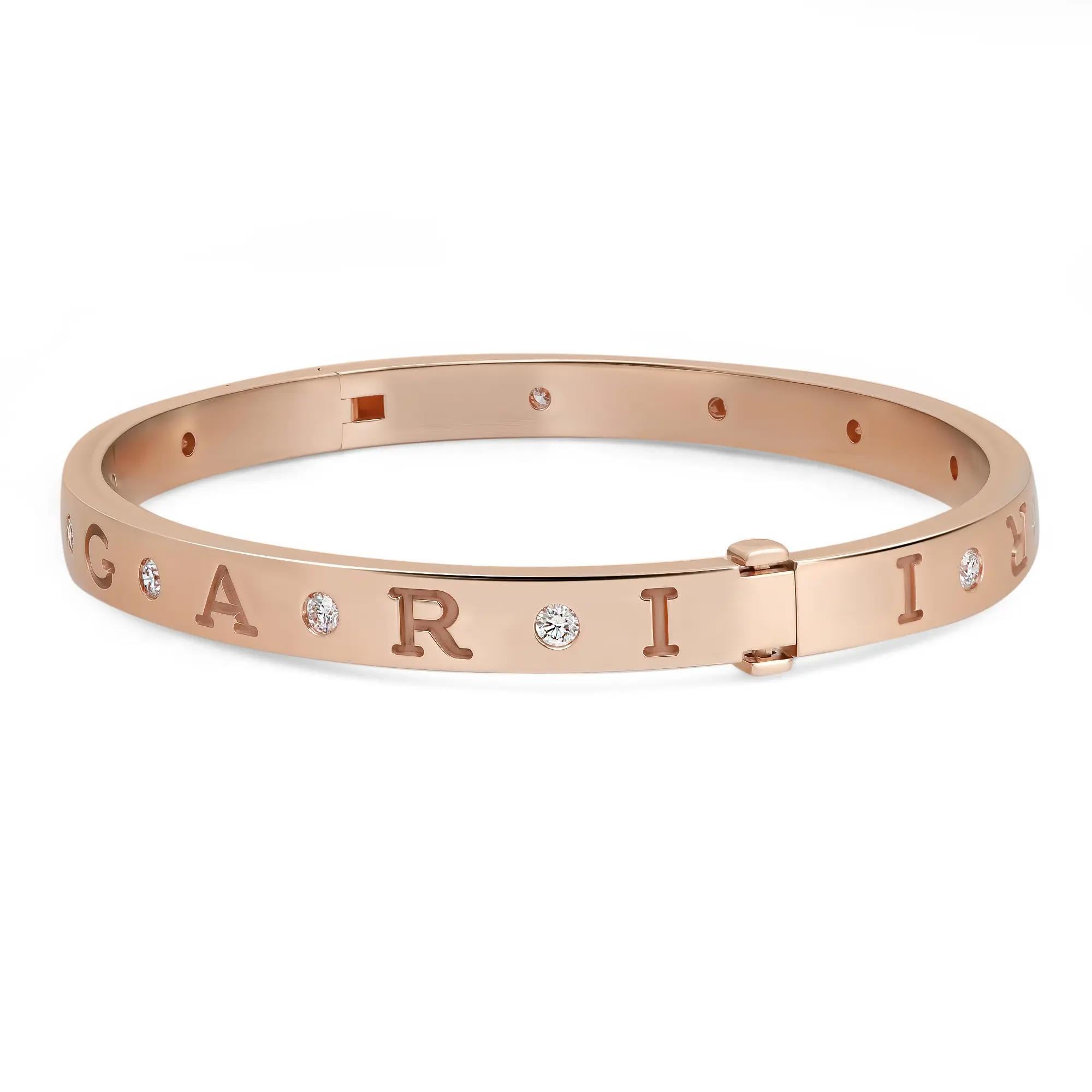 Bold and beautiful, this bracelet is a true essence of jewelry aesthetics. Crafted in lustrous 18K rose gold. This bracelet features an oval-shaped bangle studded with 12 round brilliant cut diamonds with an engraved Bvlgari logo. Super stackable