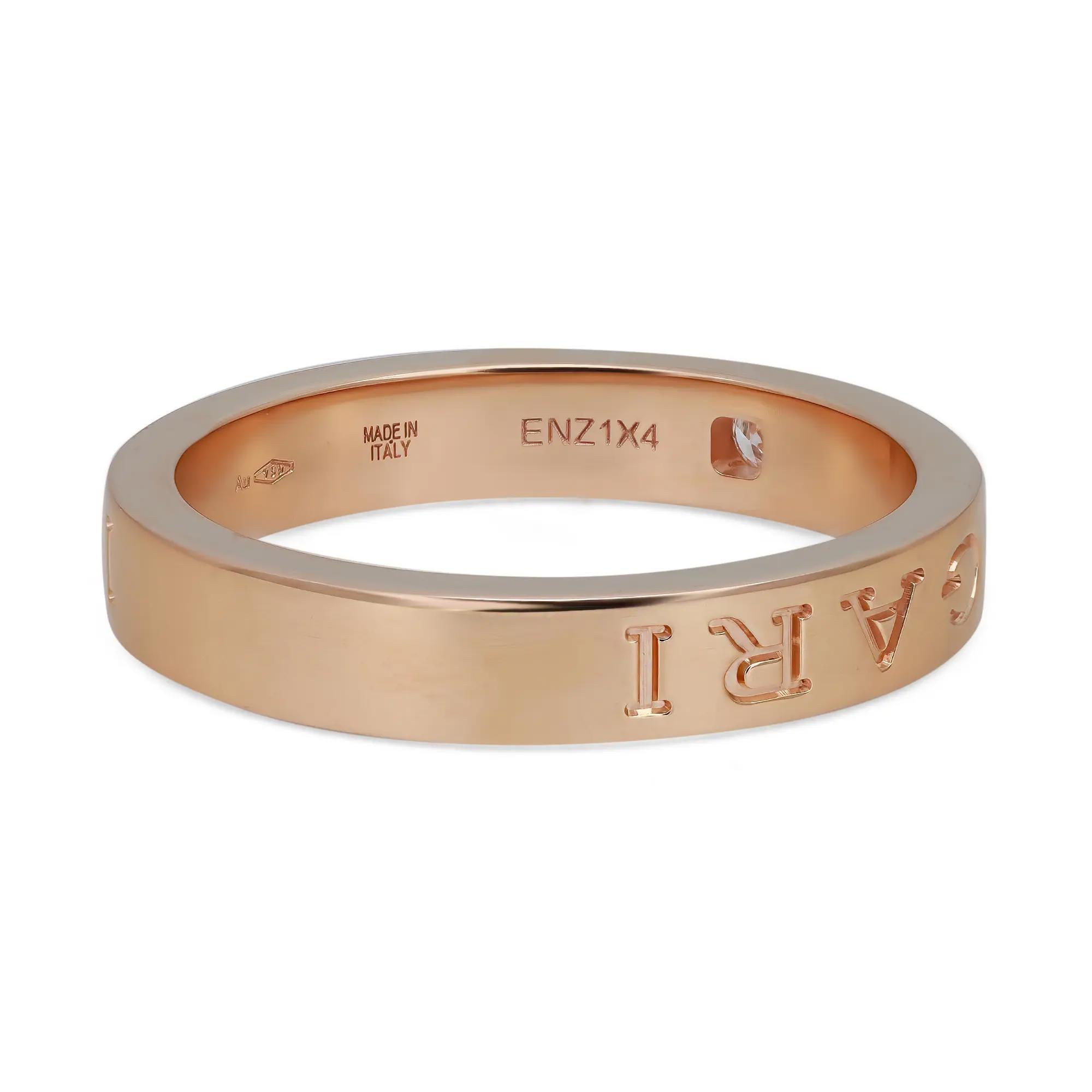 The contemporary statement of elegance by Bvlgari, this ring is crafted in lustrous 18K rose gold. It features the Bvlgari Bvlgari double logo engraving with a center single diamond weighing 0.04 carat. With modern yet timeless styling, this ring is