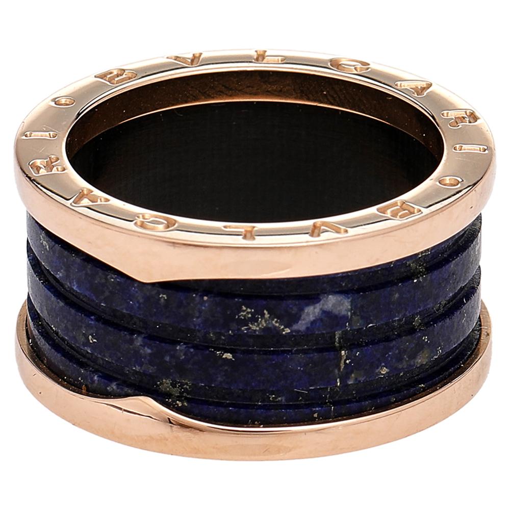 For the woman who has a refined taste in fine jewelry, Bvlgari brings her this immaculately crafted ring. Sculpted from 18k rose gold, this Bvlgari B.Zero1 ring features lapis lazuli bands stacked together. It is complete with signature