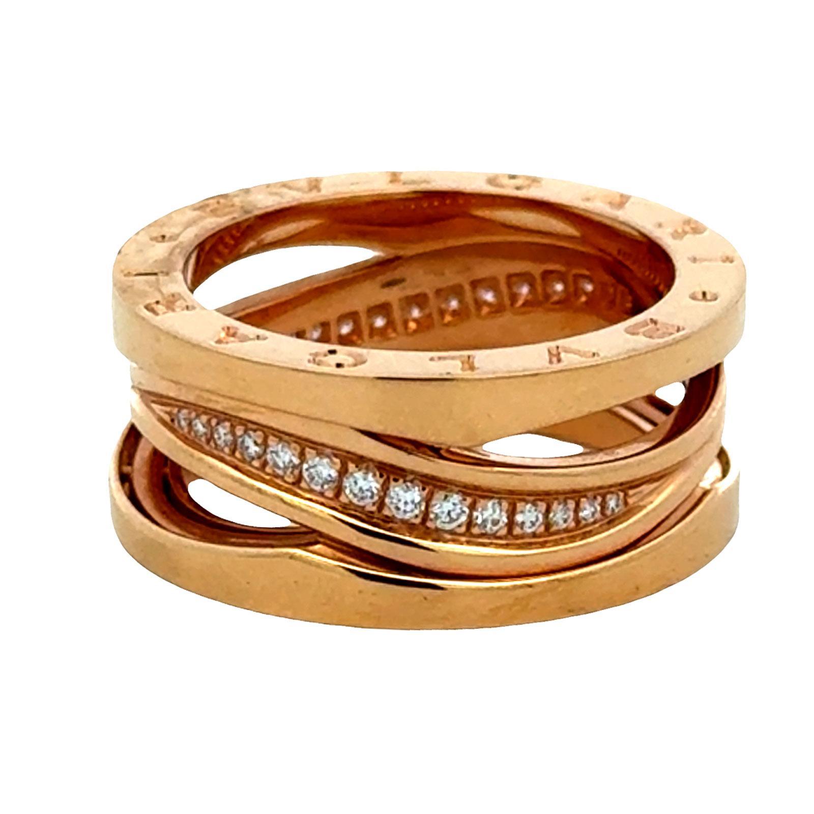 This stunning New Bvlgari B.zero1 Legend ring is crafted in luxurious 18K rose gold and accented with brilliant-cut diamonds for a touch of refined sparkle. Featuring the iconic spiral design inspired by the Colosseum, this bold and contemporary