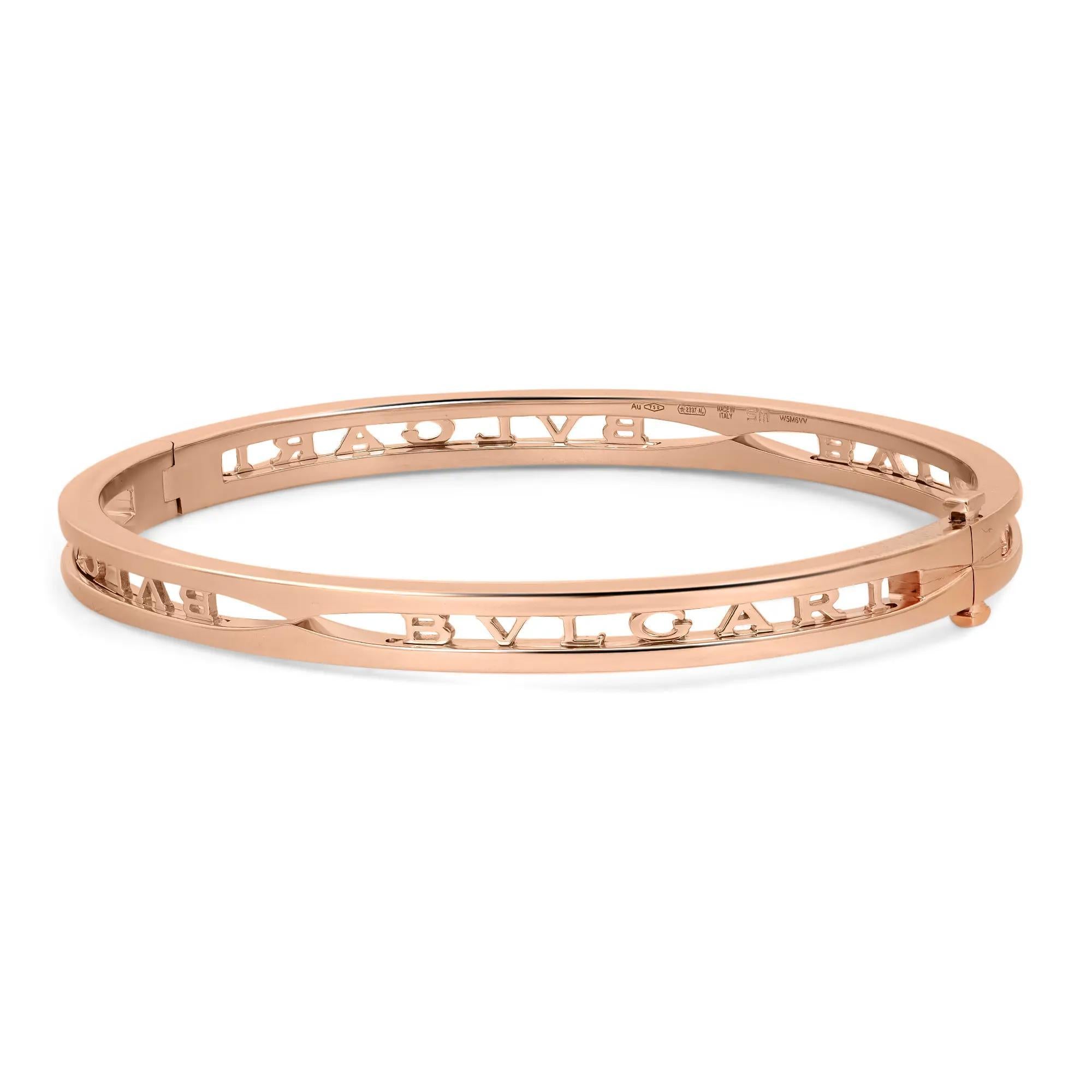 Bold and beautiful, this bracelet is a true essence of jewelry aesthetics. Crafted in lustrous 18K rose gold. This bracelet features an oval-shaped bangle with the Bvlgari logo cut out. Super stackable and easy to wear. Size: Small ( fits up to 6.5