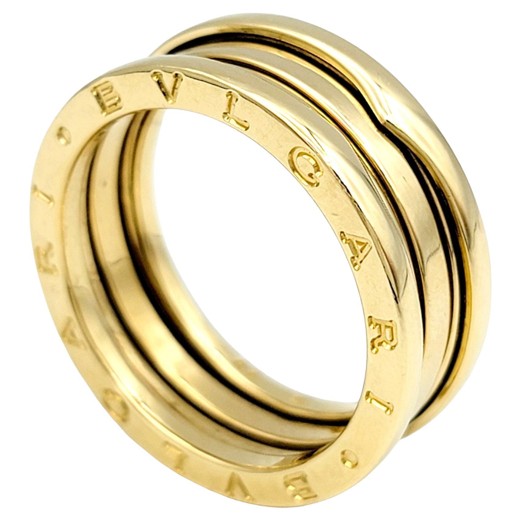 Contemporain Bvlgari B.ZERO1, bague moderne à trois anneaux en or jaune 18 carats avec logo gravé en vente