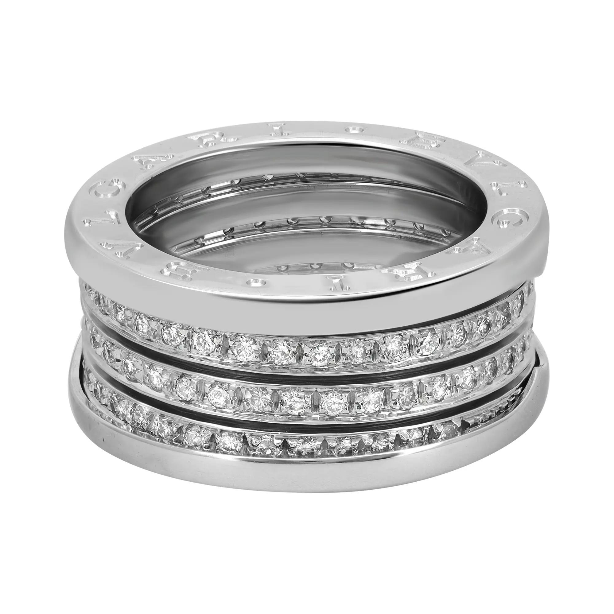 The B.Zero1 ring is a signature piece from the legendary jewelry design house Bvlgari. Crafted in fine 18K White Gold. It features a clean modern design with four internal spiral bands with pave set round cut diamonds weighing approximately 0.80