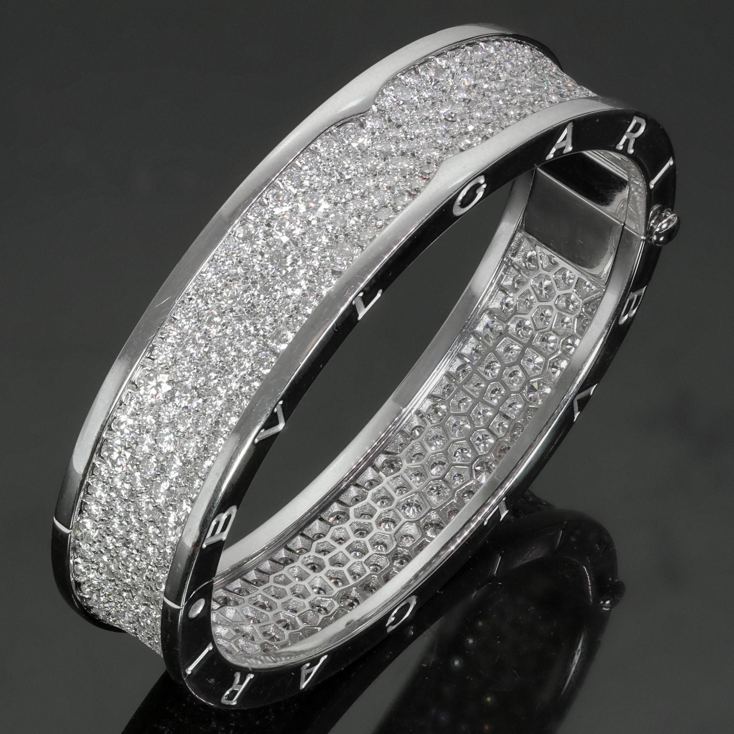 This fabulous Bvlgari bangle from the iconic B.Zero1 collection is crafted in 18k white gold and pave-set with brilliant-cut round E-F-G VVS2-VS1 diamonds weighing an estimated 9.50 carats. Made in Italy circa 2018. This is the small model of the