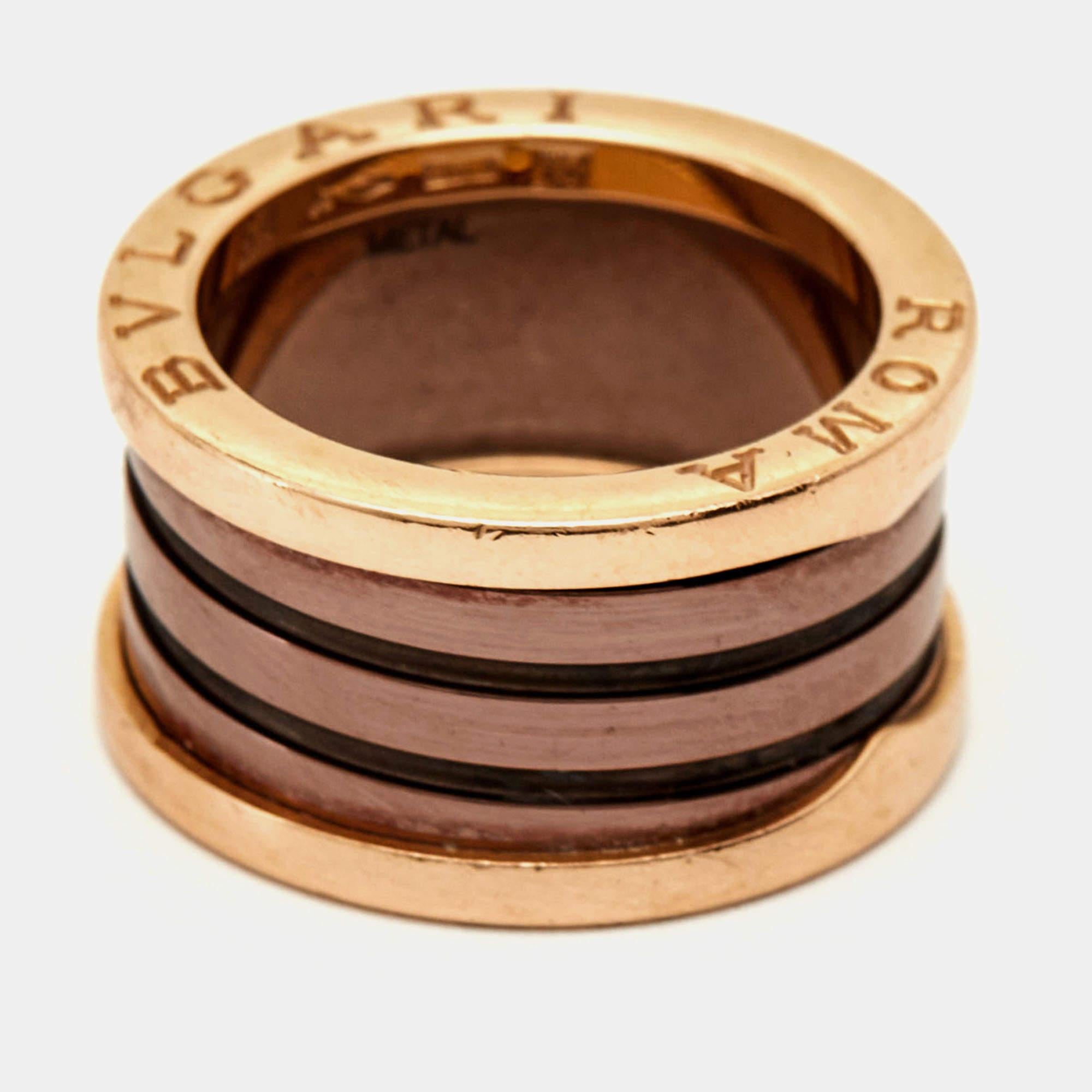 The Bvlgari B.Zero1 Roma ring is a luxurious and contemporary piece of jewelry. Crafted with precision, it features a sleek ceramic band adorned with the iconic B.Zero1 spiral motif in 18k rose gold, showcasing a perfect blend of modern design and