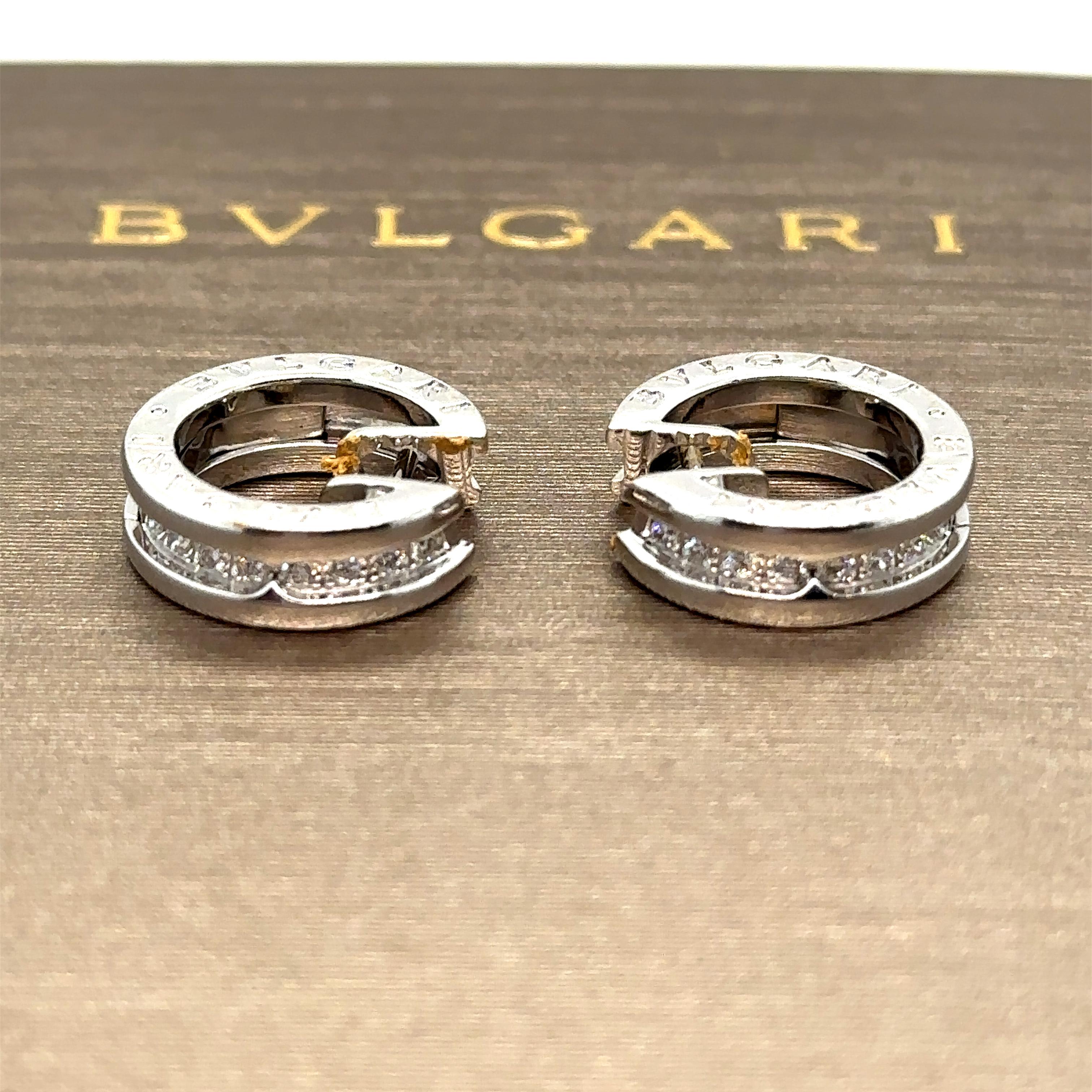 B.zero1 small hoop earrings in 18 kt white gold set with pavé diamonds on the spiral.

Metal: 18k White Gold
Carat: 0.18ct
Colour: N/A
Clarity:  N/A
Cut: Round Brilliant Cut
Weight: 9.1 grams
Engravings/Markings: N/A

Size/Measurement: N/A

Current