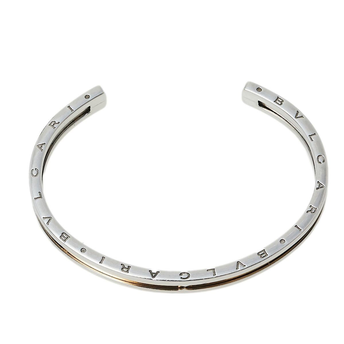 Adorn your wrist with this stunner of a bracelet from Bvlgari. The piece is from their B.Zero1 collection and has been crafted from stainless steel and 18k rose gold into an open cuff style. It is complete with the brand's lettering on the contours.