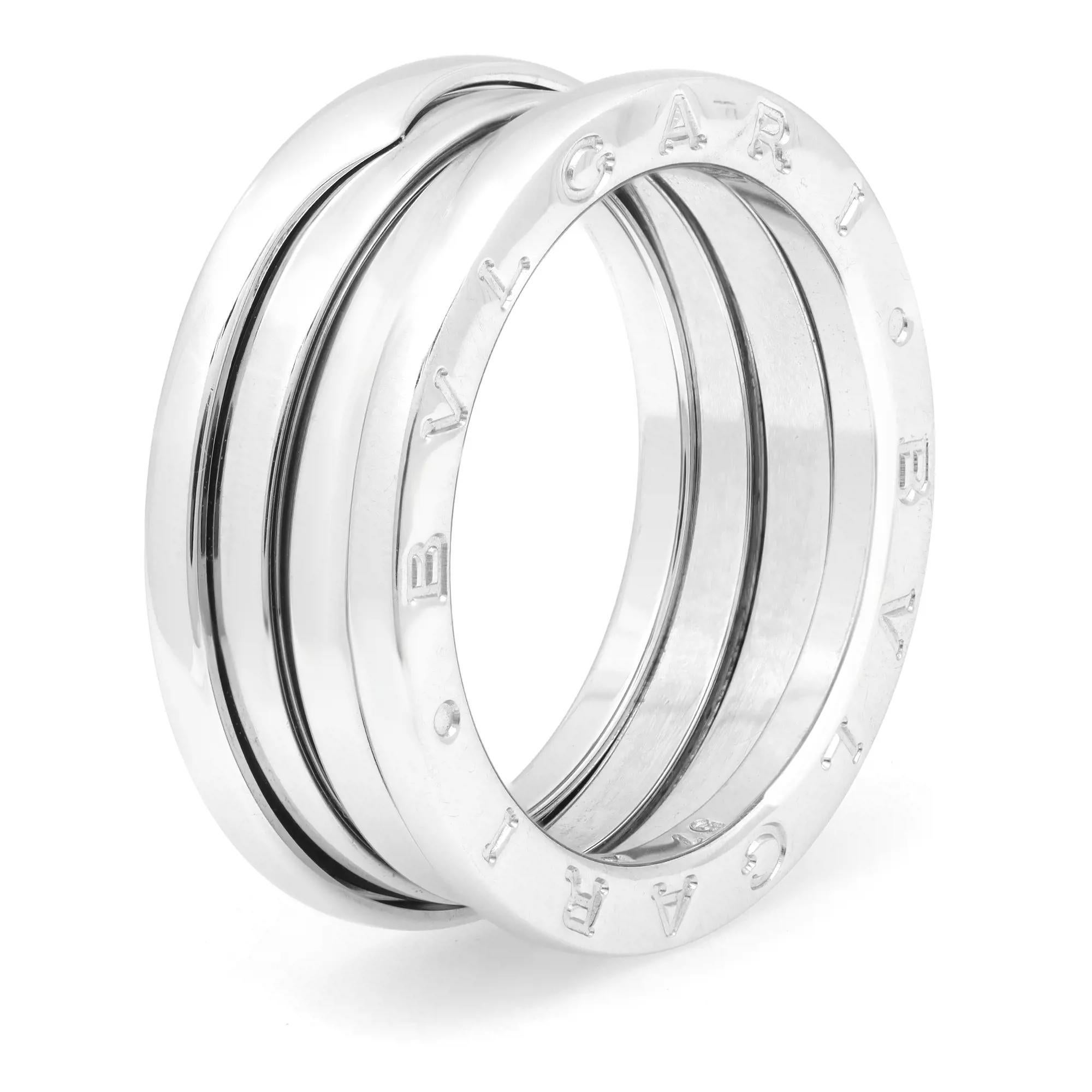 The B.Zero1 ring is a signature piece from the legendary jewelry design house Bvlgari. Crafted in fine 18K White Gold. It features a clean modern three spiral band ring engraved with the BVLGARI logo on both sides. This ring makes a great timeless