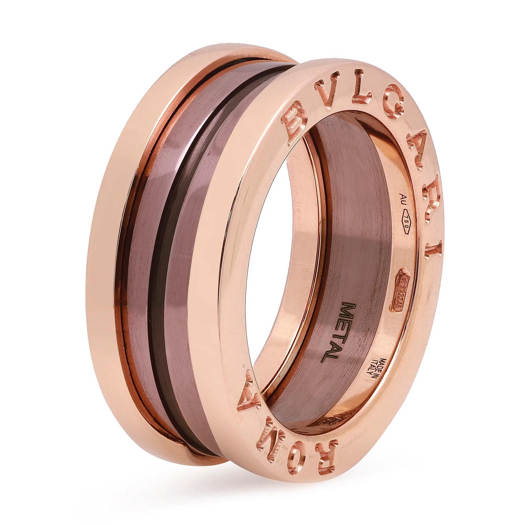 The B.Zero1 ring is a signature piece from the legendary jewelry design house Bvlgari. Crafted in fine 18K rose gold and ceramic. It features a clean modern design with two internal ceramic spiral bands surrounded by two rose gold rims engraved with