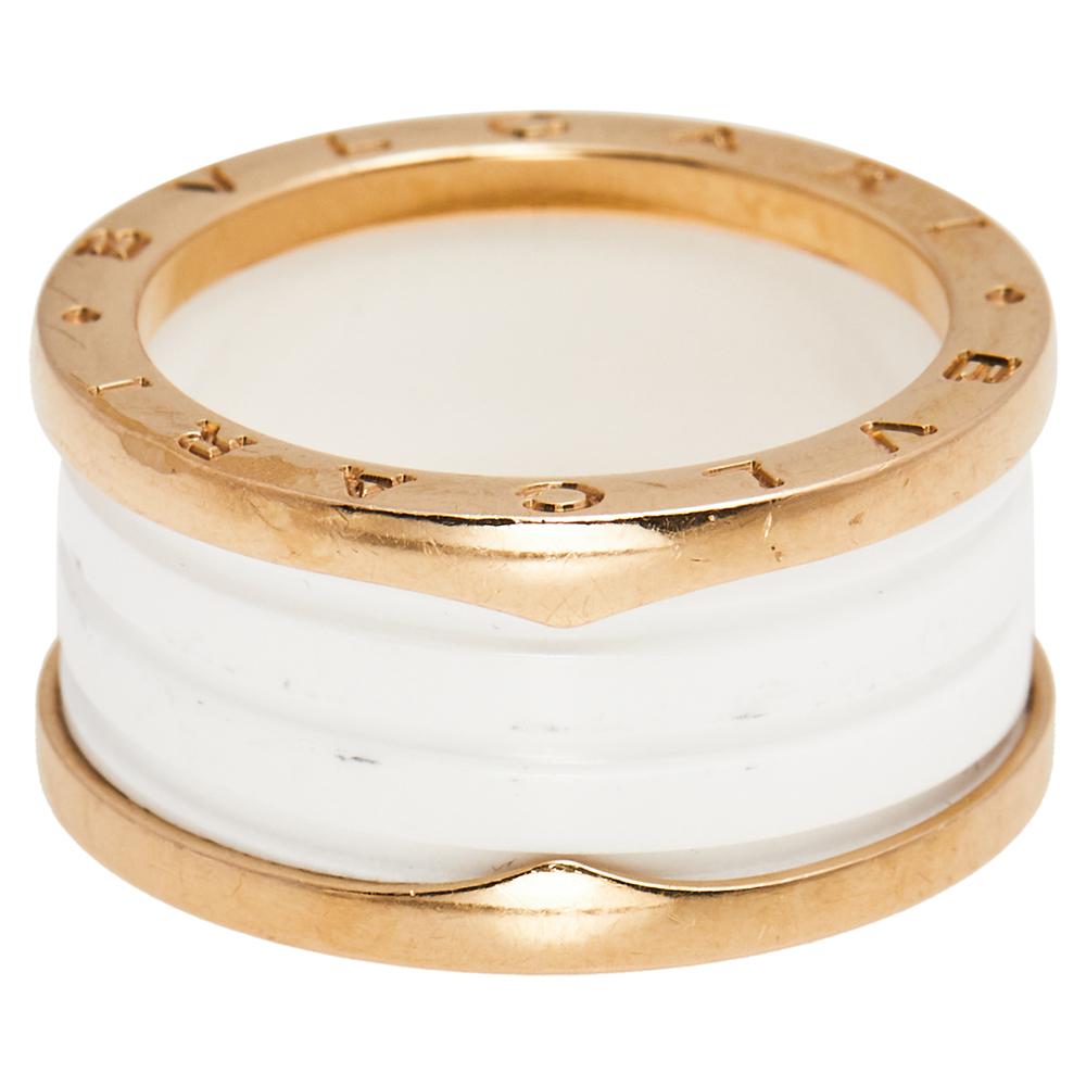 For the woman who has a refined taste in fine jewelry, Bvlgari brings her this immaculately crafted ring. Sculpted from 18k rose gold, this Bvlgari B.Zero1 ring features white ceramic bands stacked together. It is complete with signature