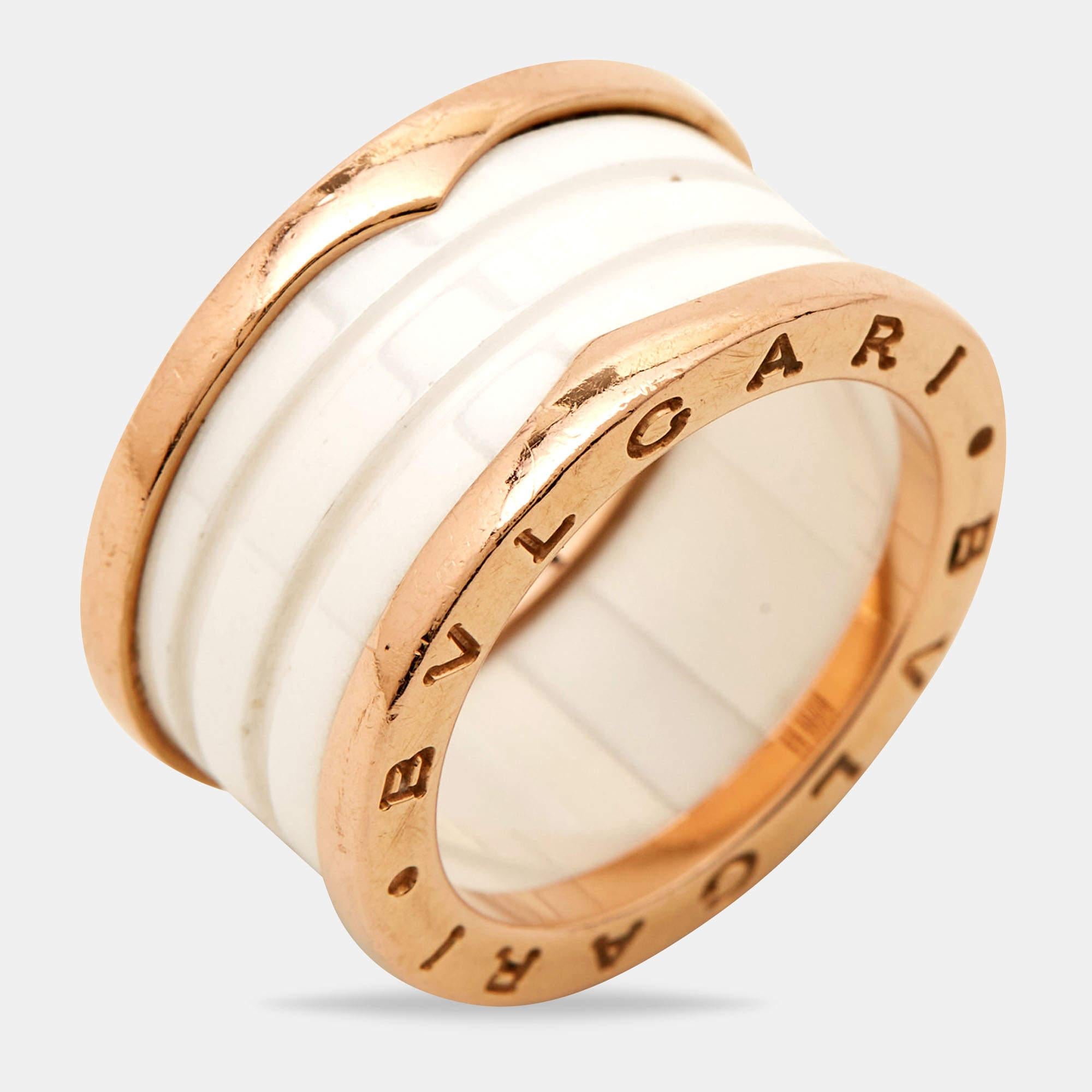 Unique and modern, this charming B.Zero1 band ring is from one of Bvlgari's iconic collections. Beautifully crafted from 18k rose gold and white ceramic, the ring has a stack of bands. Inspired by the Colosseum, this ring merges exceptional creative