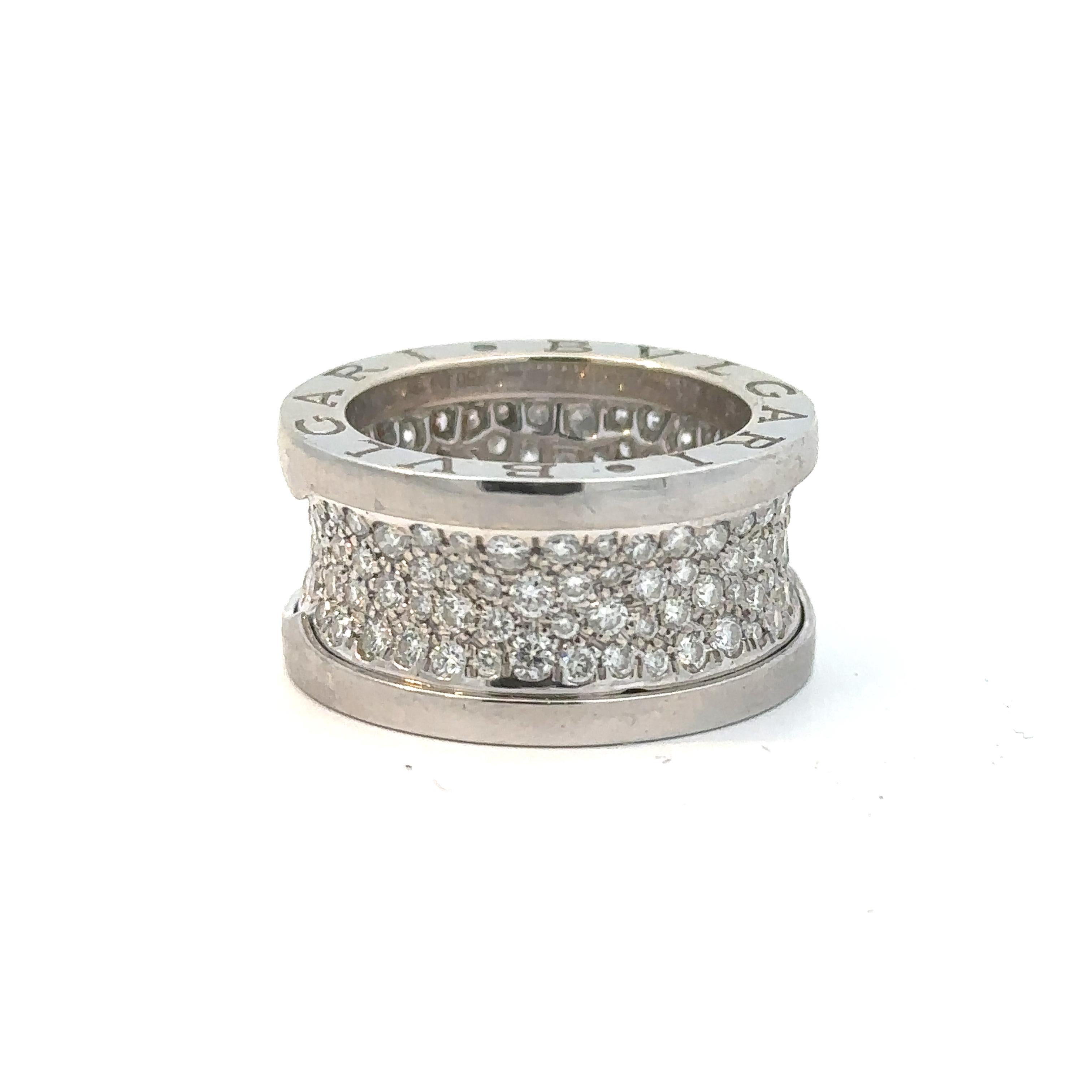 The BVLGARI B.zero1 White Gold Pavé Diamond Ring is a luxurious and contemporary piece of jewelry that embodies the brand's innovative spirit and exceptional craftsmanship. Crafted in 18k white gold, the ring features a distinctive spiral design