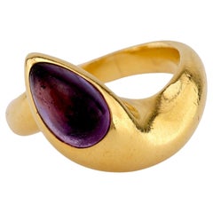Bvlgari Bague solitaire en or jaune 18 carats avec améthyste cabochon