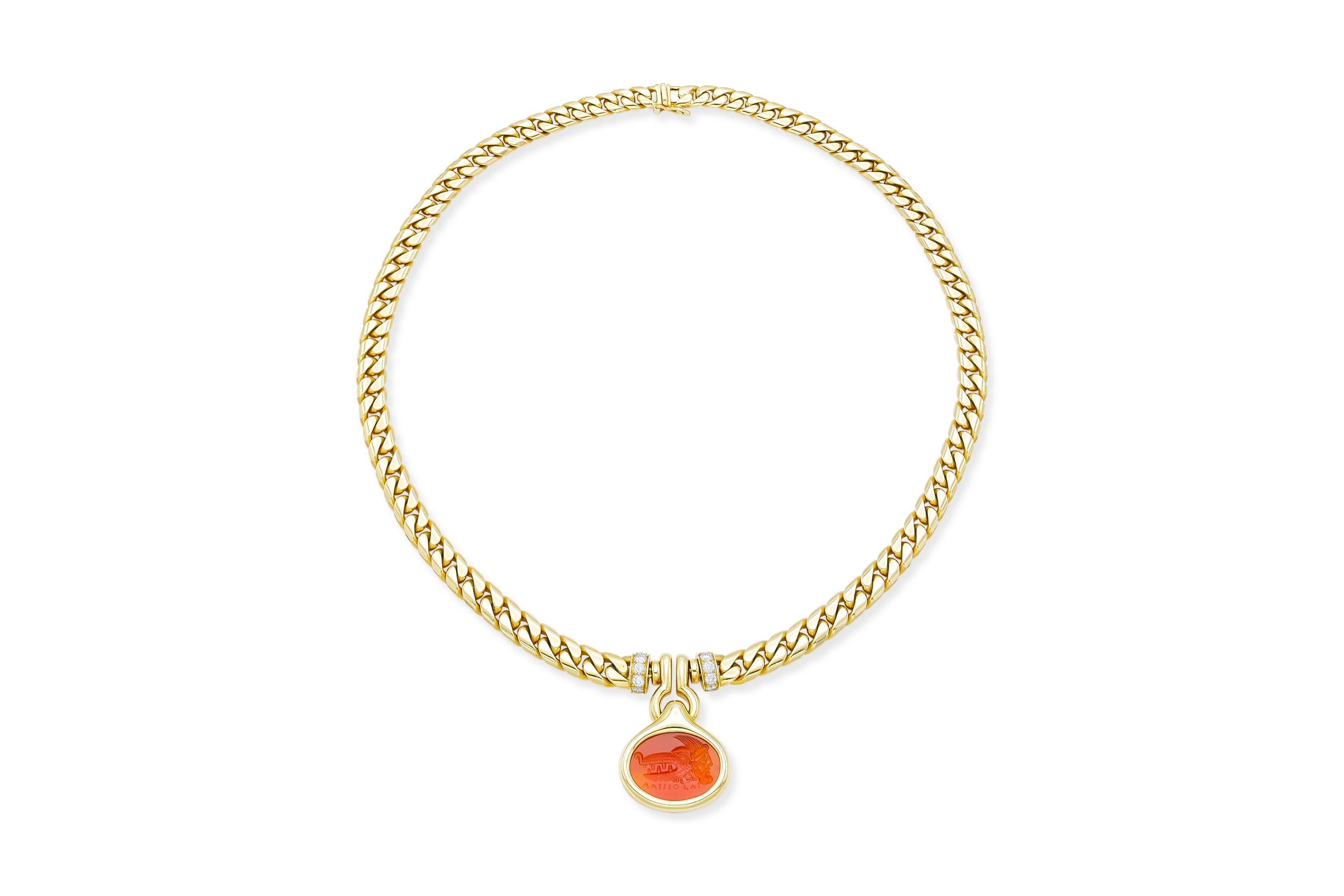 Finely crafted in 18k yellow gold with a Carnelian Intaglio from 1810.
The necklace features 10 round brilliant cut diamonds weighing approximately a total of 0.56 carats.
Signed by Bvlgari
Circa 1970s