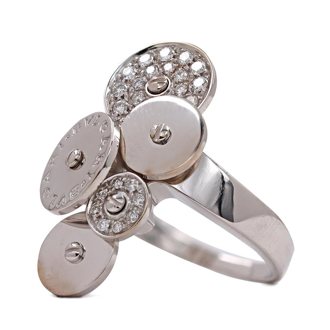 Authentic Bvlgari 'Cicladi' ring crafted in 18 karat white gold. The ring is composed of a cluster of 5 spinning circular discs of various size, including 3 discs that are encrusted in round brilliant cut diamonds for an estimated 0.20 carats total