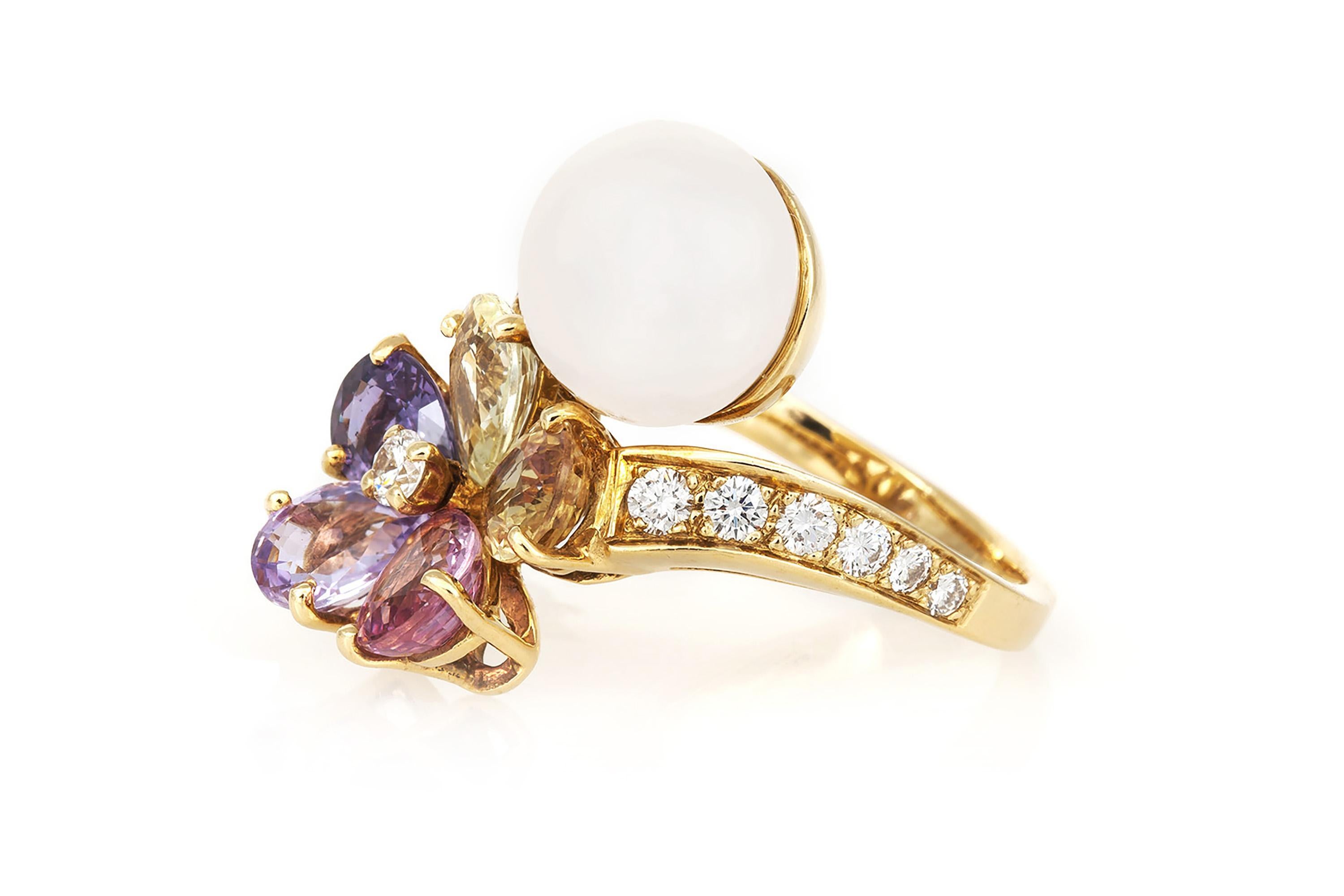 Finely crafted in 18k yellow gold with a Pearl, multicolor Sapphires and Round Brilliant cut Diamonds weighing approximately a total of 1.00 carat. 
Signed by Bvlgari
Size 7