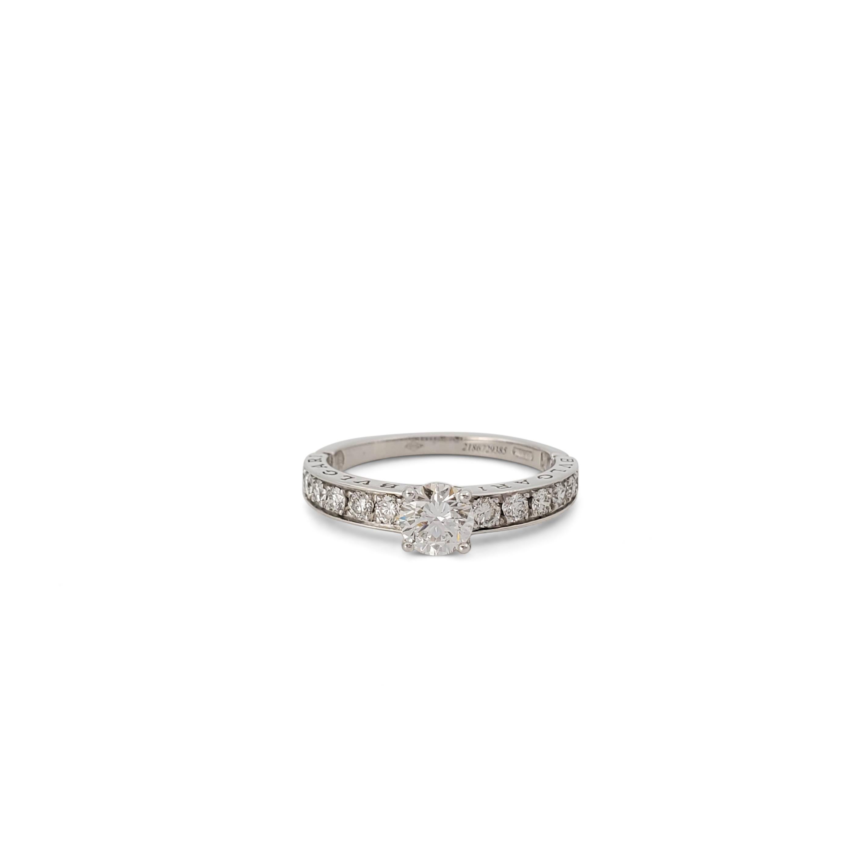 Authentic Bvlgari engagement ring from the 'Dedicata a Venizia' collection crafted in platinum features a four-prong set round brilliant cut diamond weighing 0.50 carat (D color, VS clarity) which is highlighted by an additional 0.65 carats of round