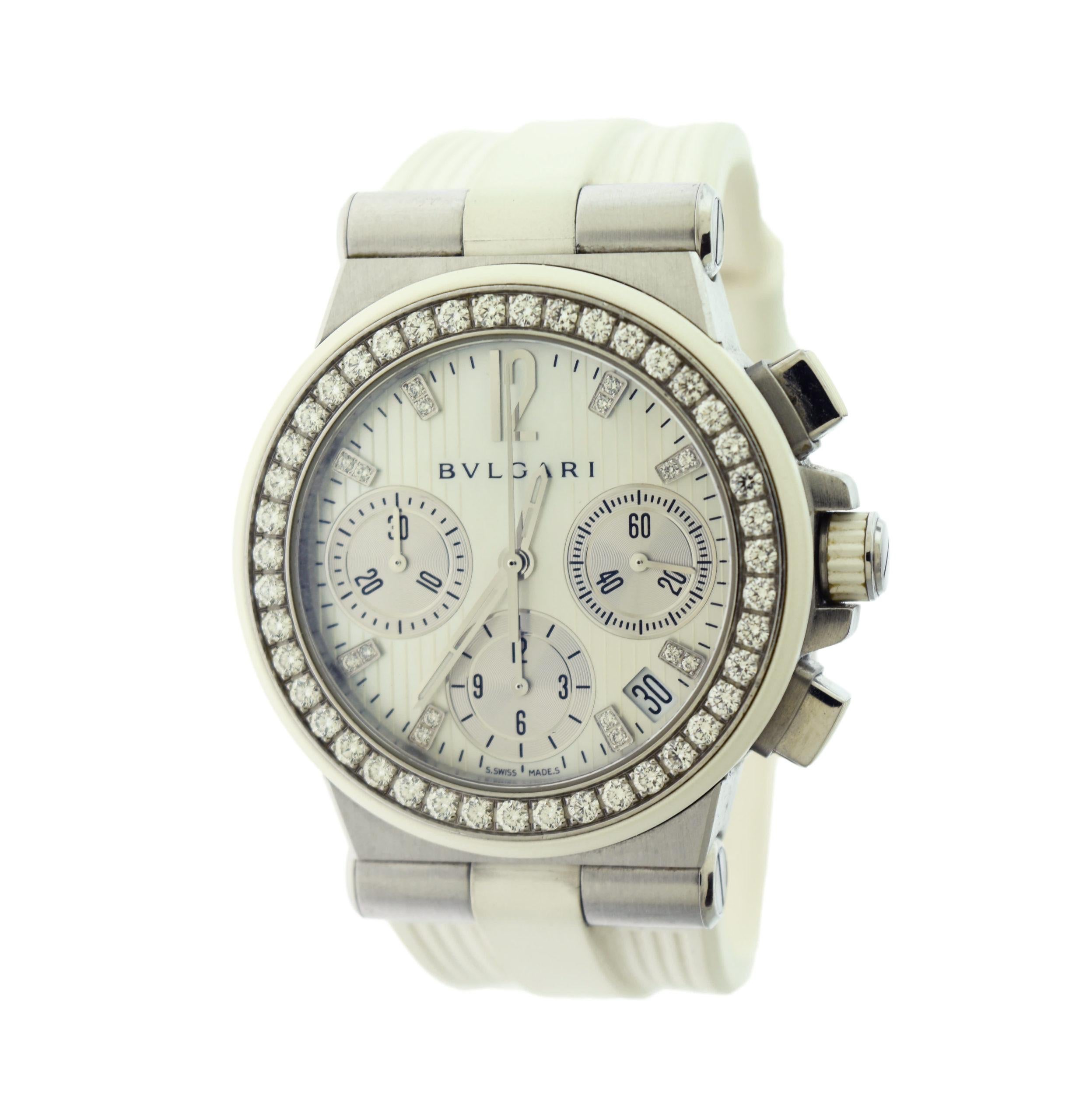 Designer: Bvlgari

Style: Watch

Metal: Stainless Steel

Stones: Round Brilliant Cut Diamonds

Case Size: 35mm

Dial: White Mother of Pearl; Chronograph

Bezel: Diamond Set

Crystal: Scratch Resistant Sapphire

Sub Dial :  Three – 60 Second, 30
