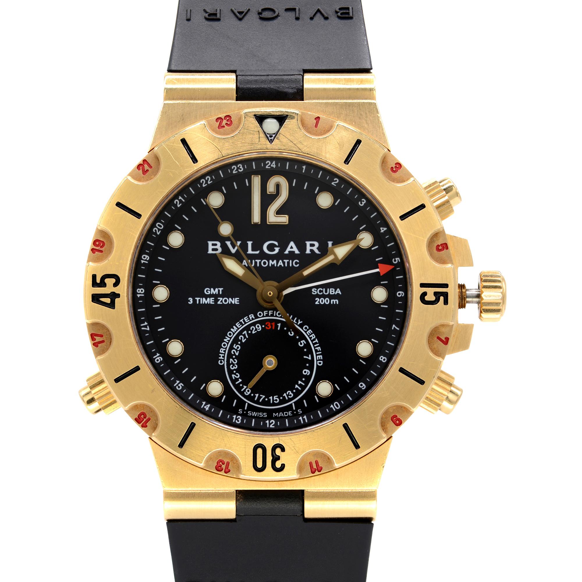 Pre-owned Bvlgari Diagono Scuba 38mm 3 Time Zone 18k Yellow Gold Black Dial Watch SD 38 G GMT. Bezel has visible scratches as in pictures.. This Timepiece is Powered by Mechanical (Automatic) Movement And Features:  18k Yellow Gold Case With Black