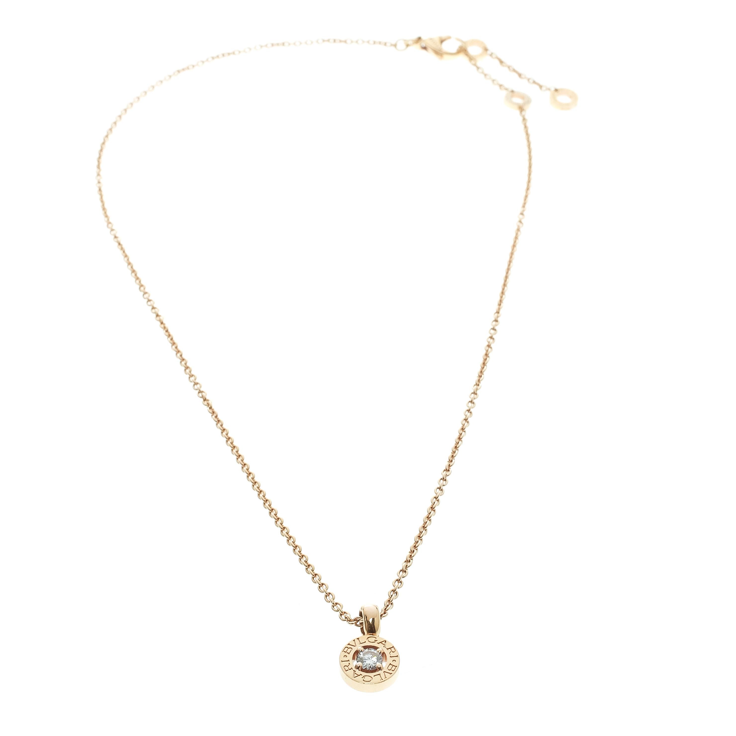 This gorgeous necklace from Bvlgari is an expression of elegance and subtle charm. It is sculpted in 18k rose gold and is centered by a gold ring engraved with twin logos, inspired by the inscriptions on the ancient coins, and is framed by a round