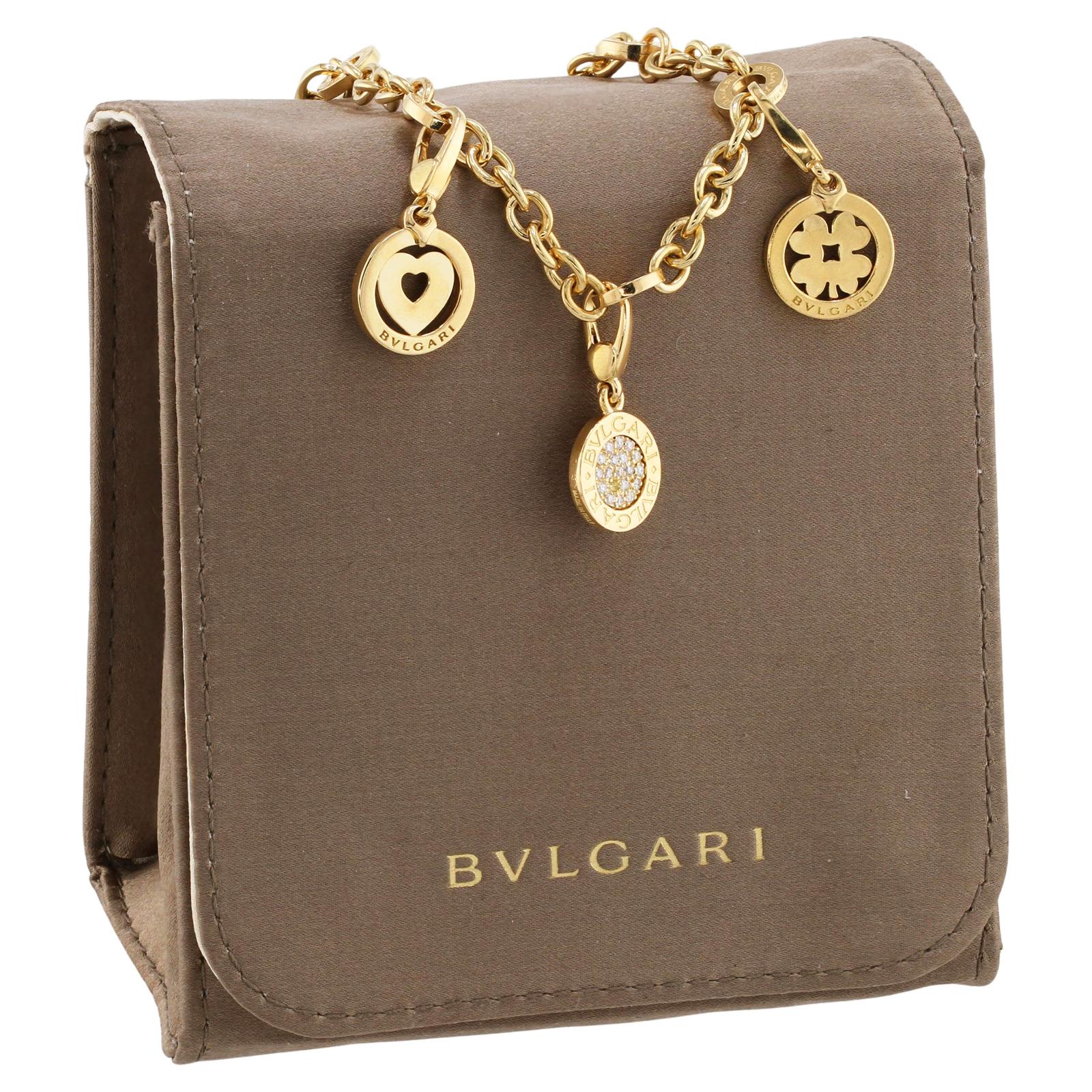 BVLGARI Diamond 5-Charm 18k Yellow Gold Bracelet  In Excellent Condition For Sale In New York, NY